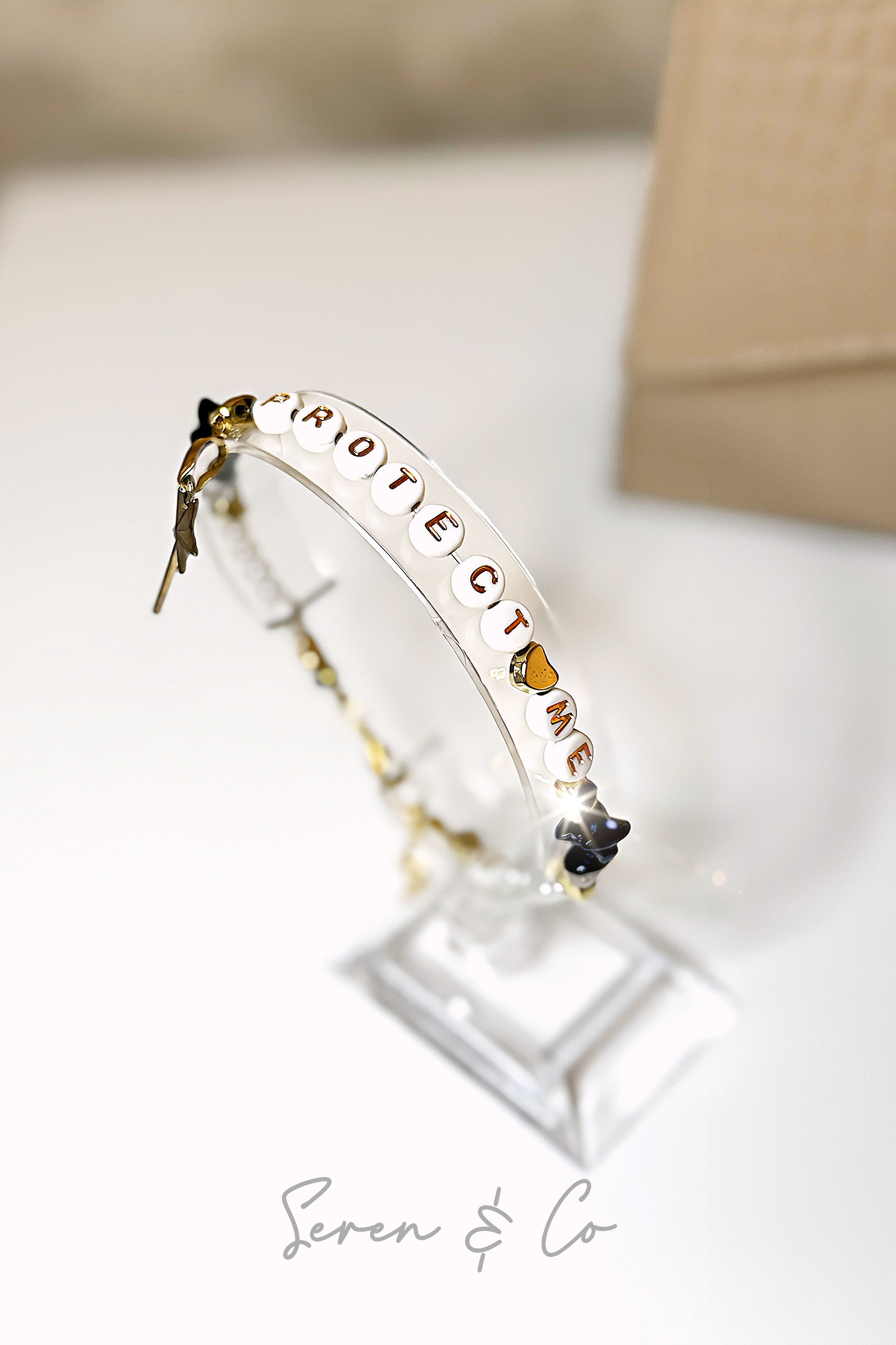 The Dark Matter Charm bracelet (Black Obsidian & Clear Quartz)