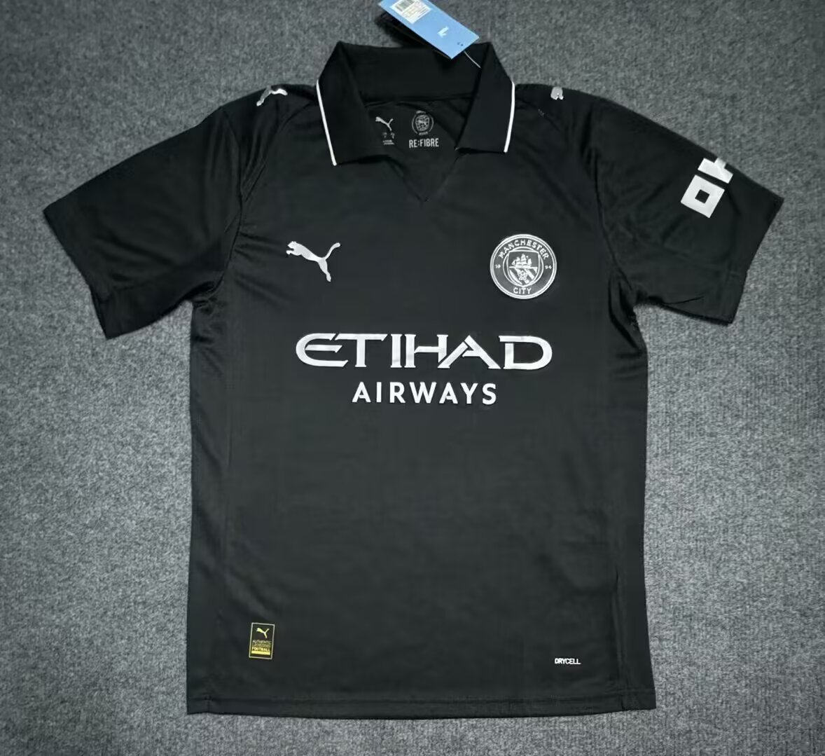 Manchester City away adults