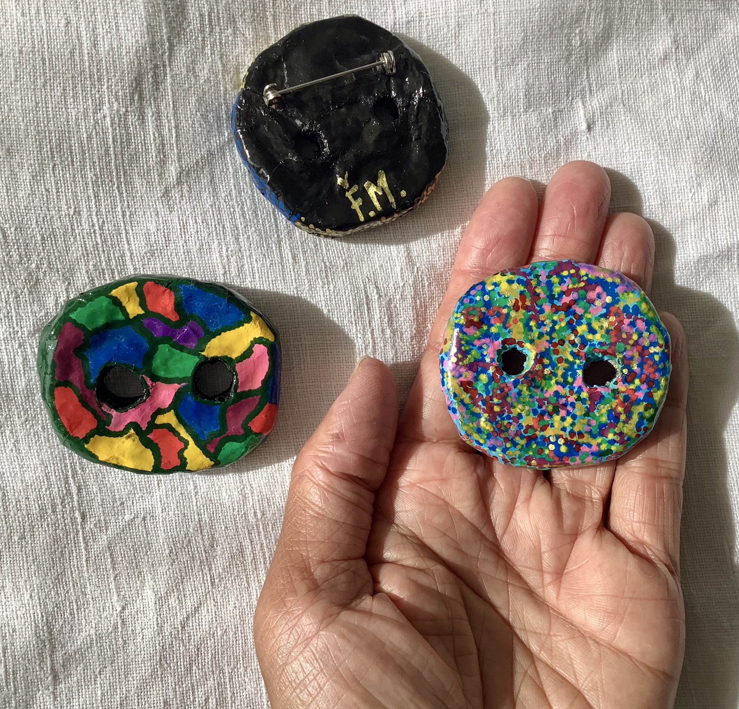 Giant buttons brooches