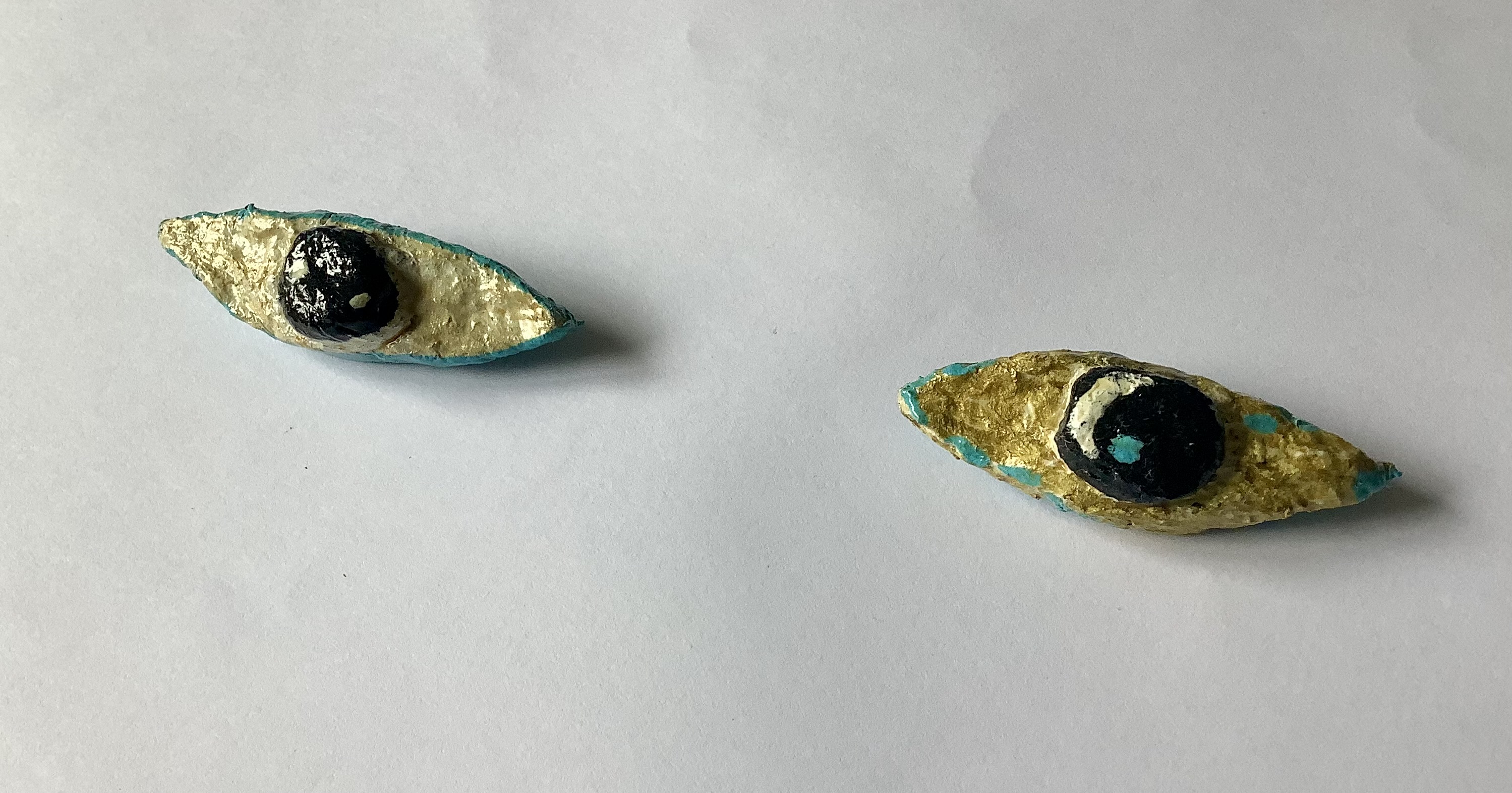 Eye brooches