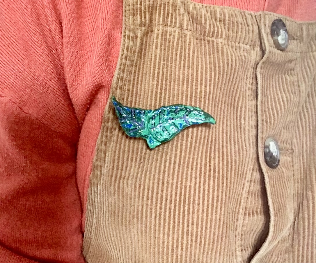 Leafy green brooches