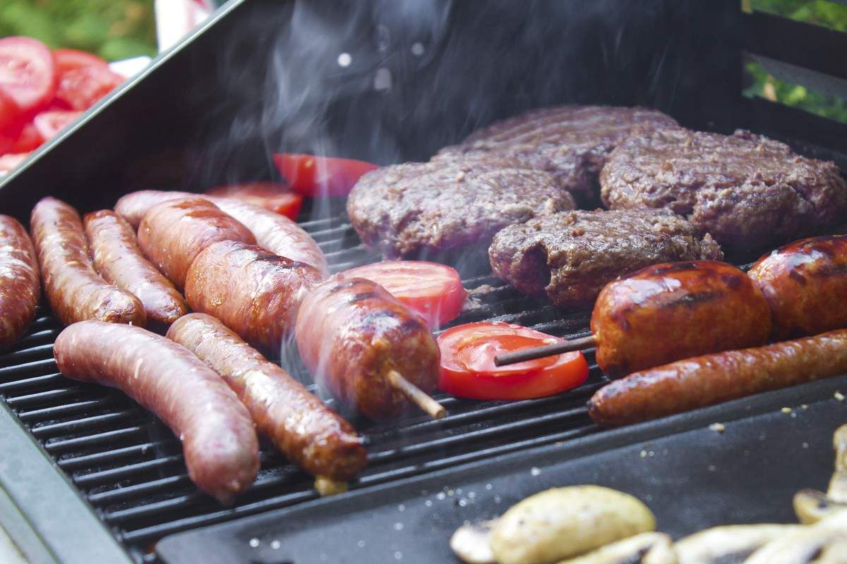 Meat cooking on grill