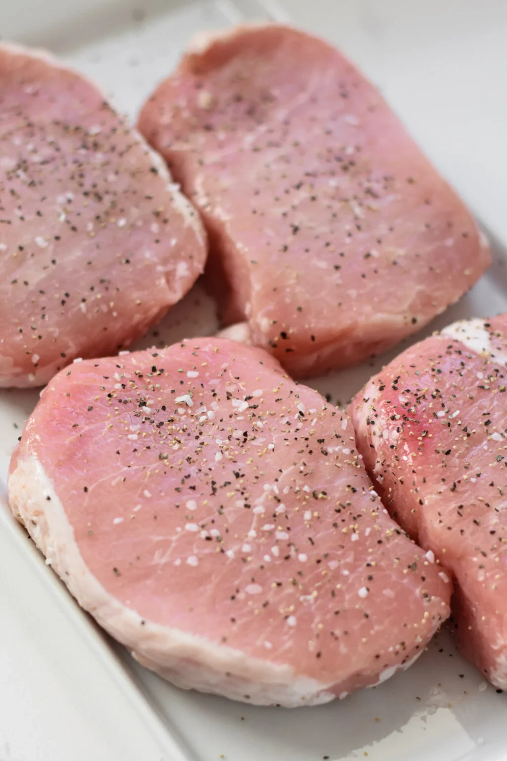 When should you season meat?
