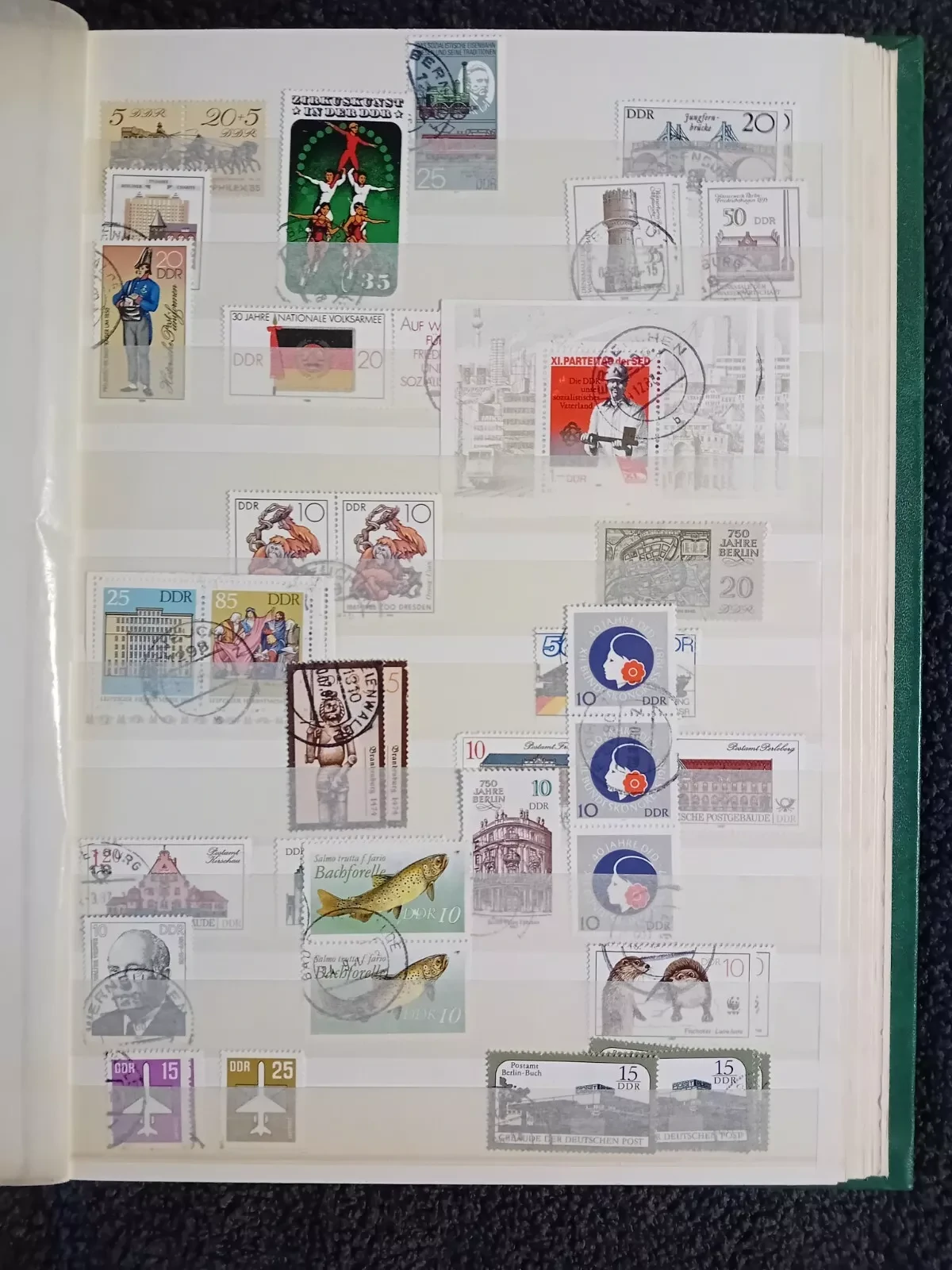 E Germany DDR used stamps in 15 page/30 side album only 10 pages have stamps
