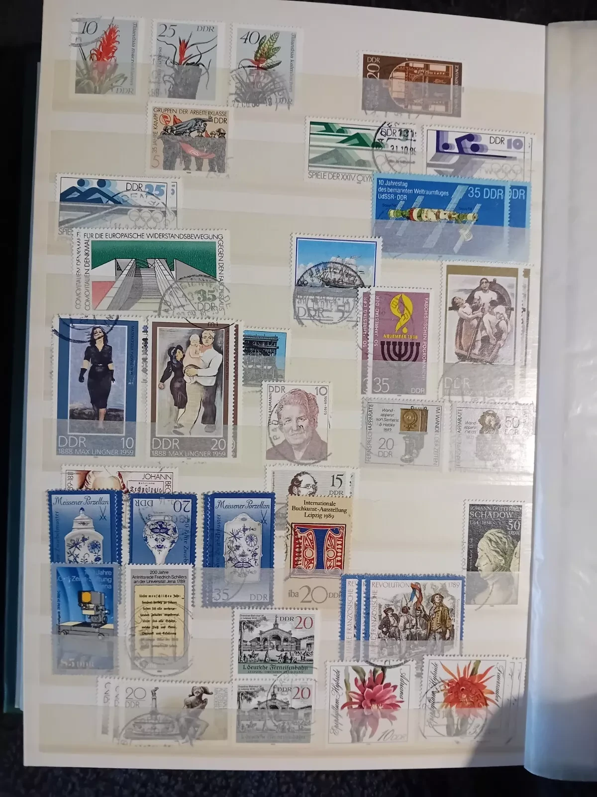 E Germany DDR used stamps in 15 page/30 side album only 10 pages have stamps