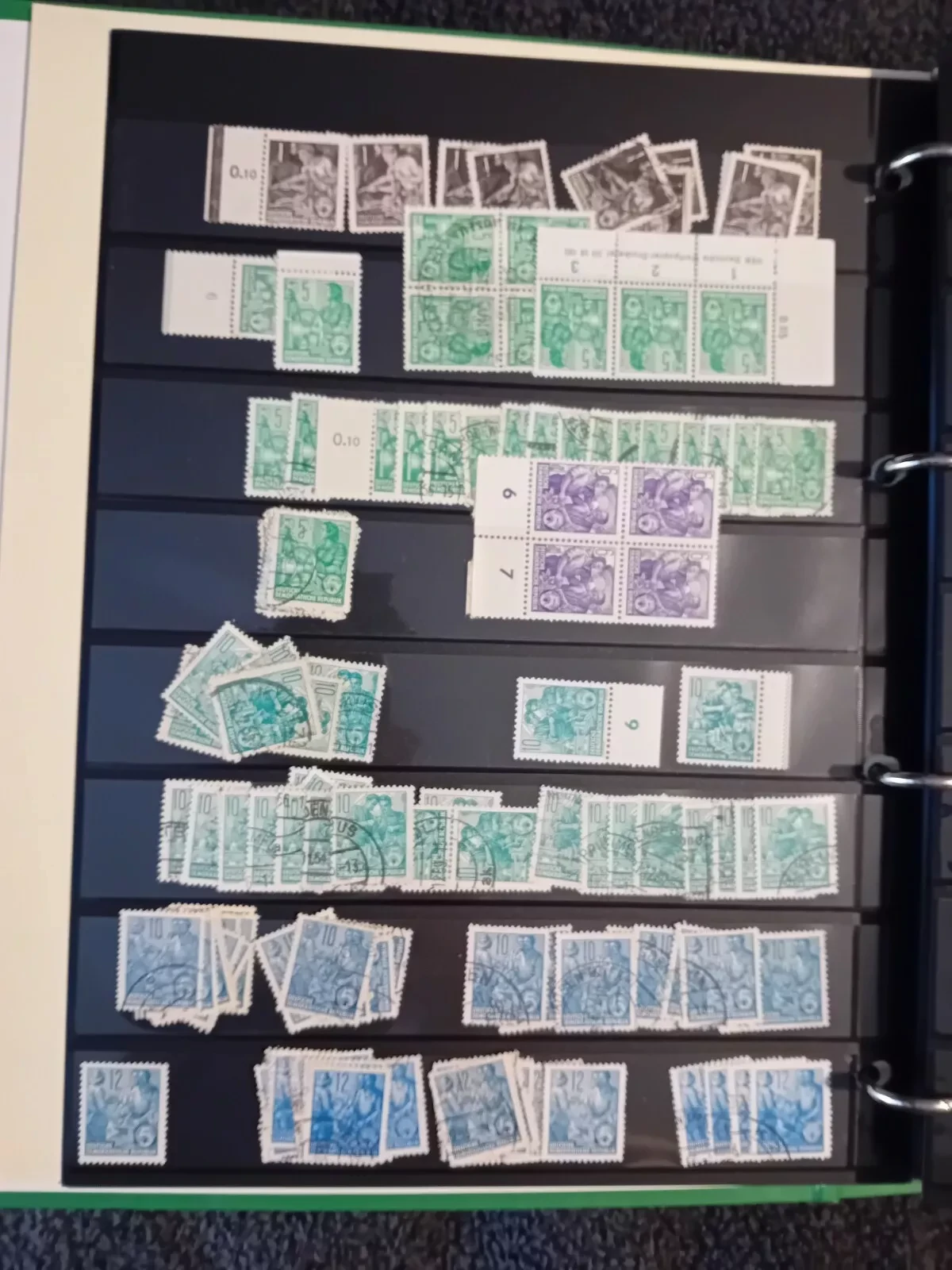 E Germany DDR used stamps on pages in folder all pages with stamps shown