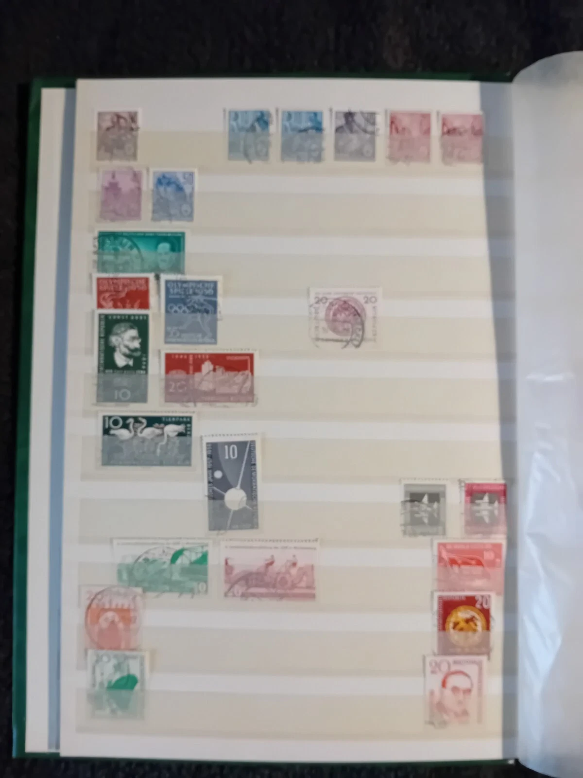 E Germany DDR used stamps in 15 page/30 side album only 10 pages have stamps