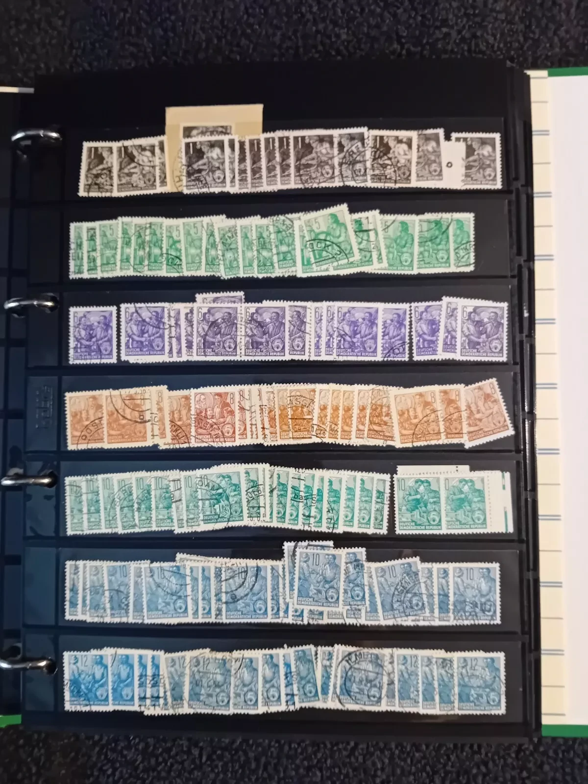 E Germany DDR used stamps on pages in folder all pages with stamps shown