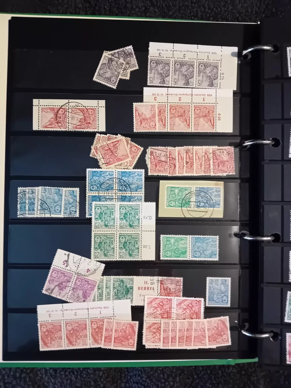 E Germany DDR used stamps on pages in folder all pages with stamps shown