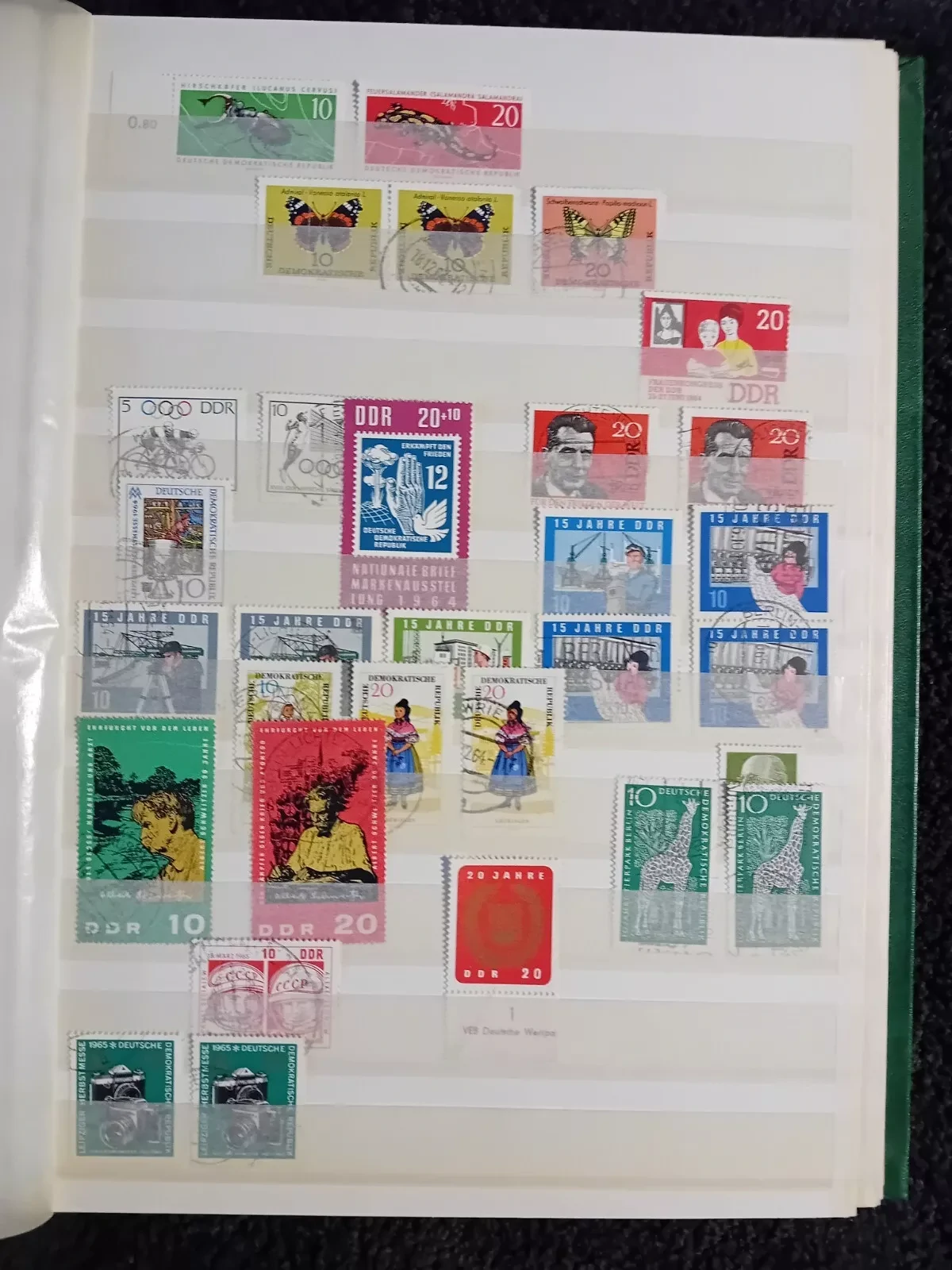 E Germany DDR used stamps in 15 page/30 side album only 10 pages have stamps