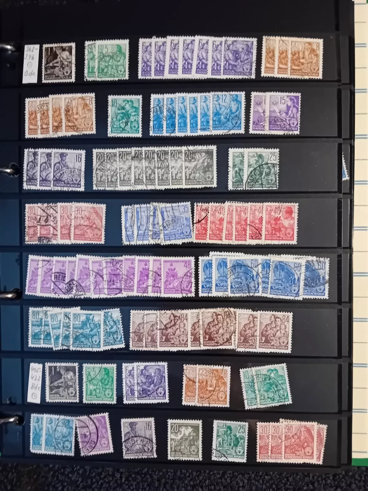 E Germany DDR used stamps on pages in folder all pages with stamps shown
