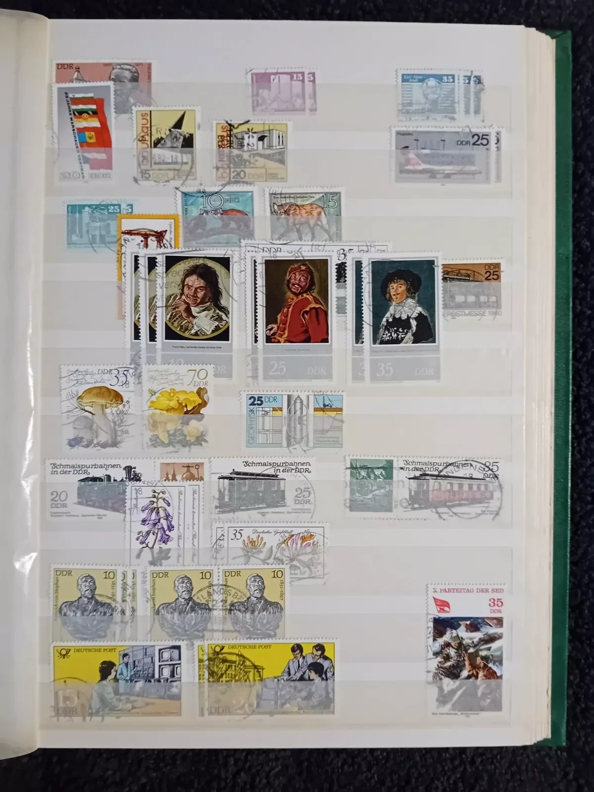 E Germany DDR used stamps in 15 page/30 side album only 10 pages have stamps