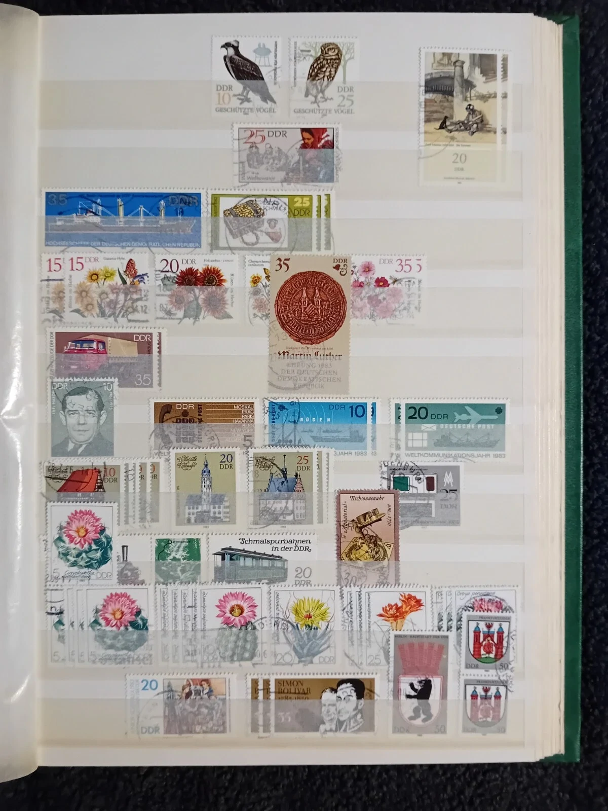 E Germany DDR used stamps in 15 page/30 side album only 10 pages have stamps