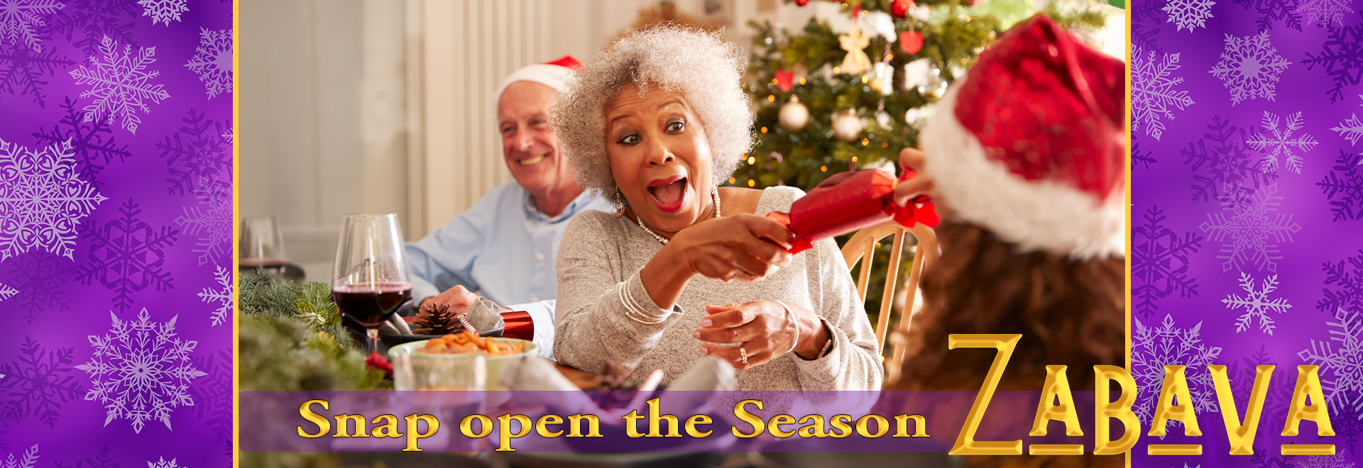 Family pulling Zabava DIY Christmas crackers and laughing