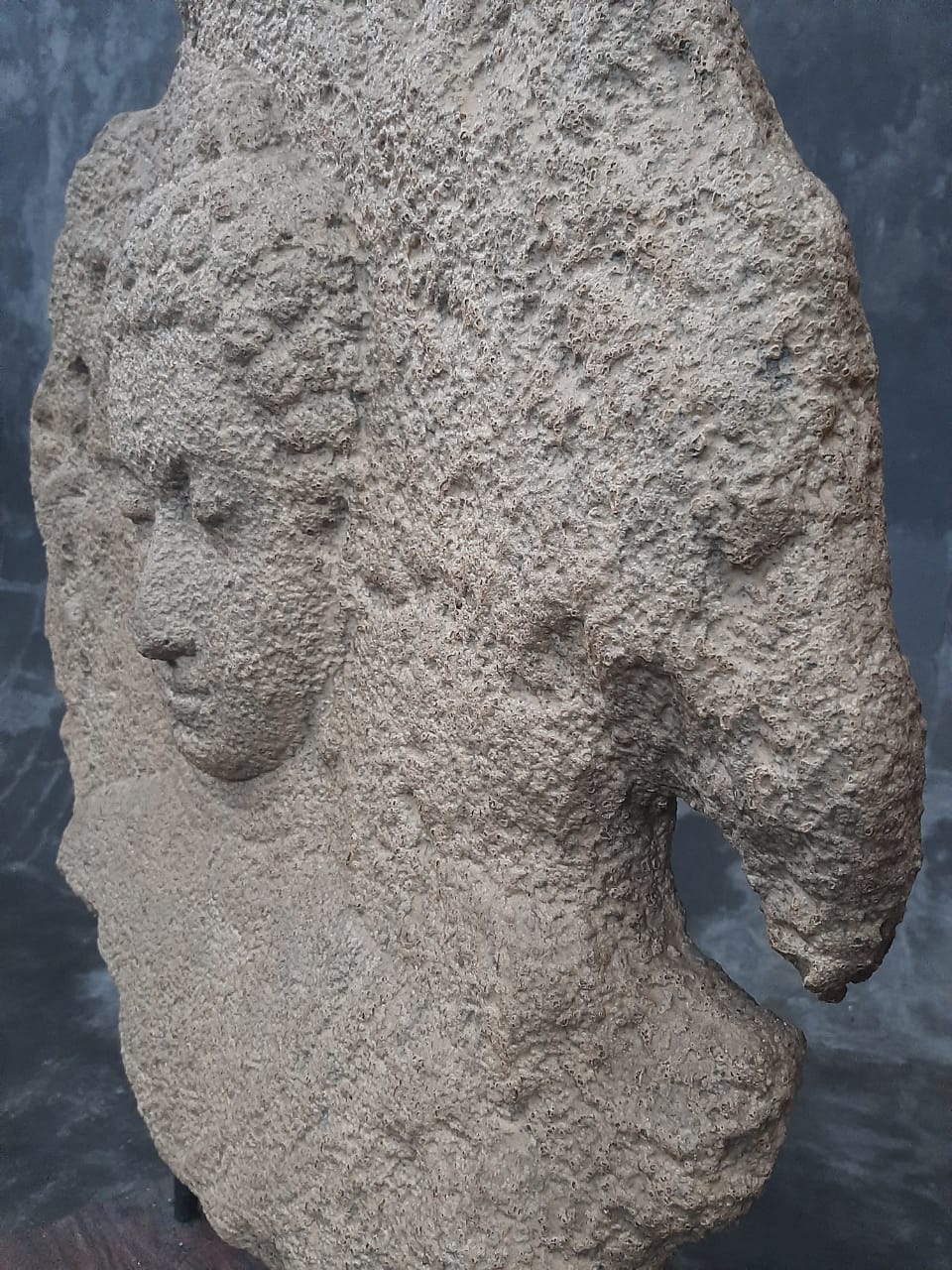 Decorative Stone Circle with Buddha Head Carving