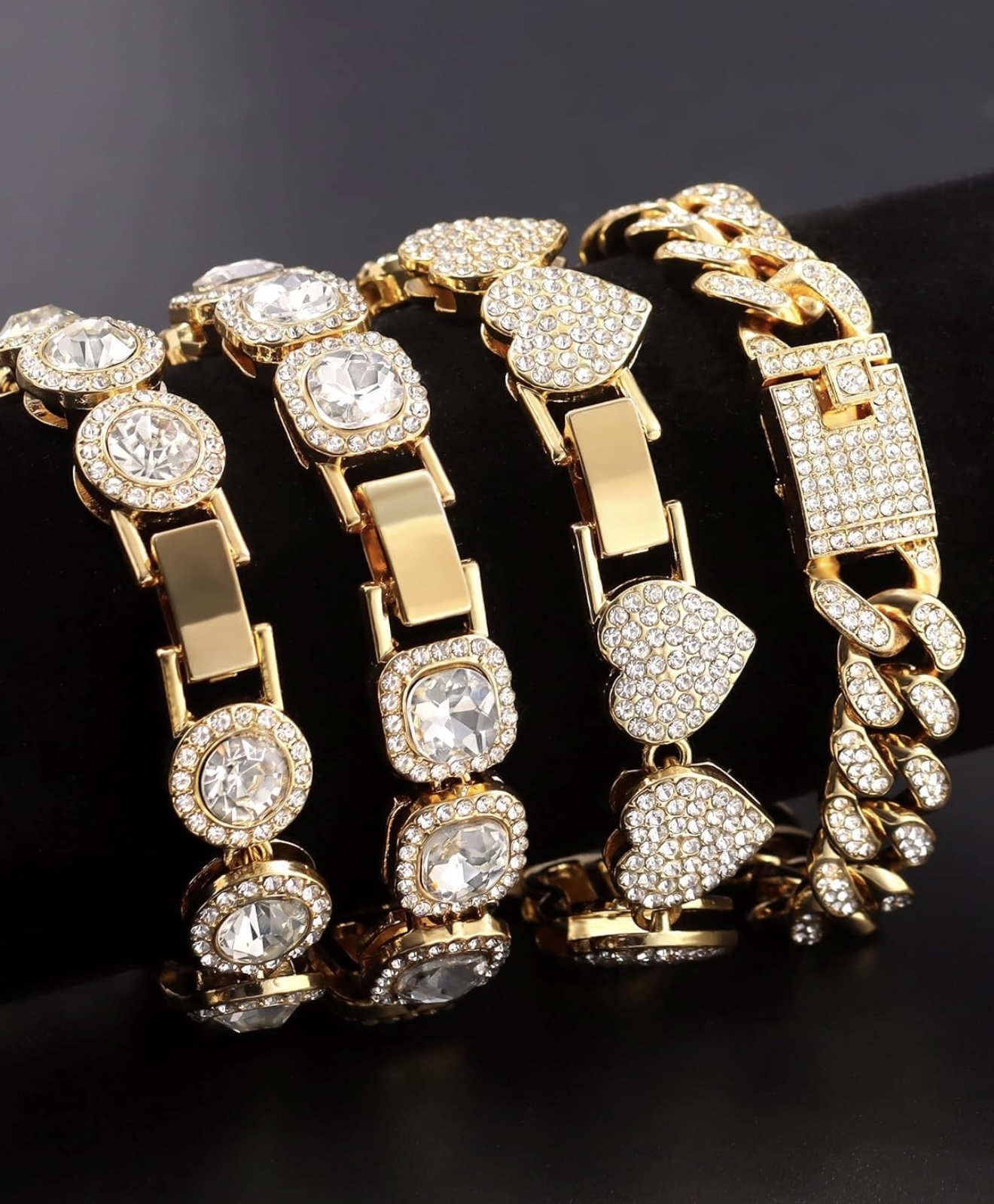 4 golden toned & iced bracelets