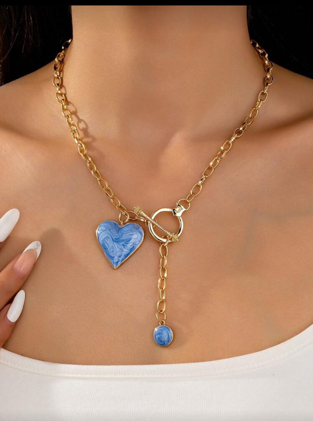 Blue heart & gold tone necklace