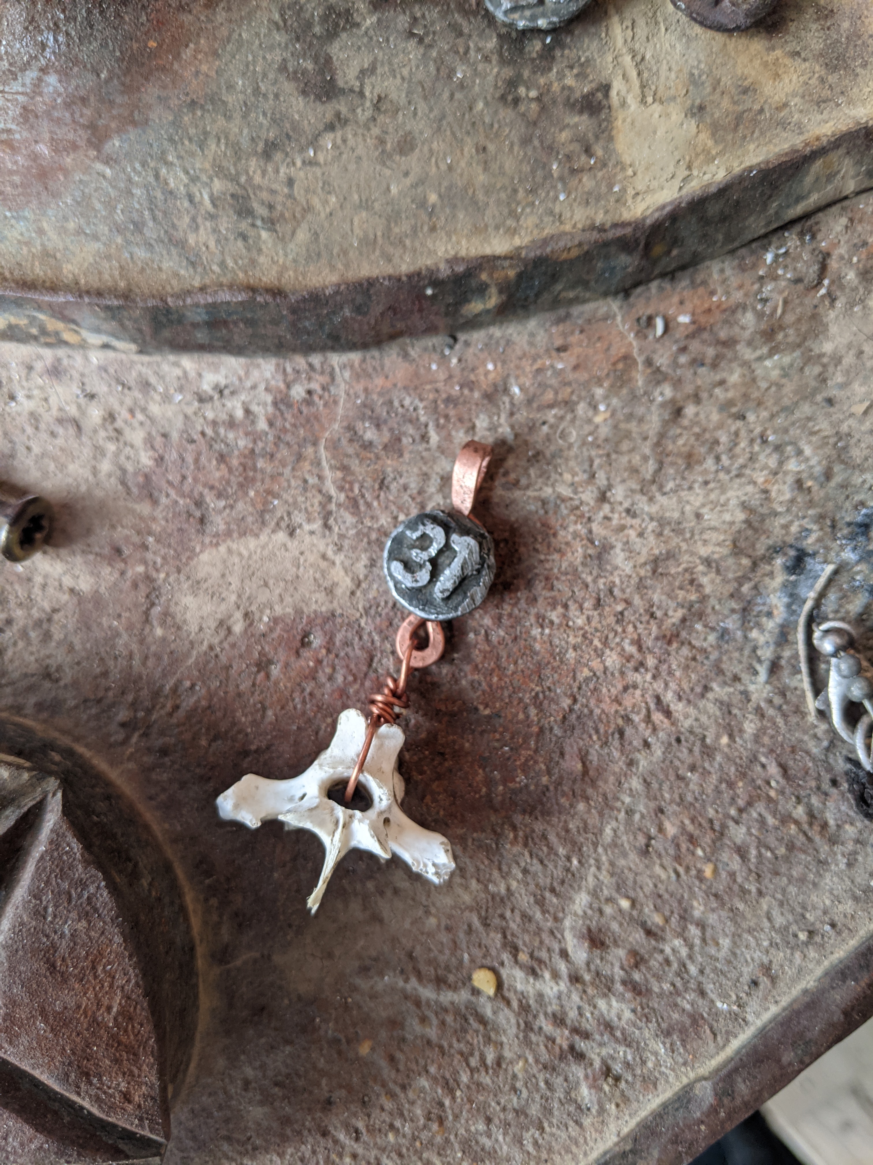 Date Nail bone pendant #37