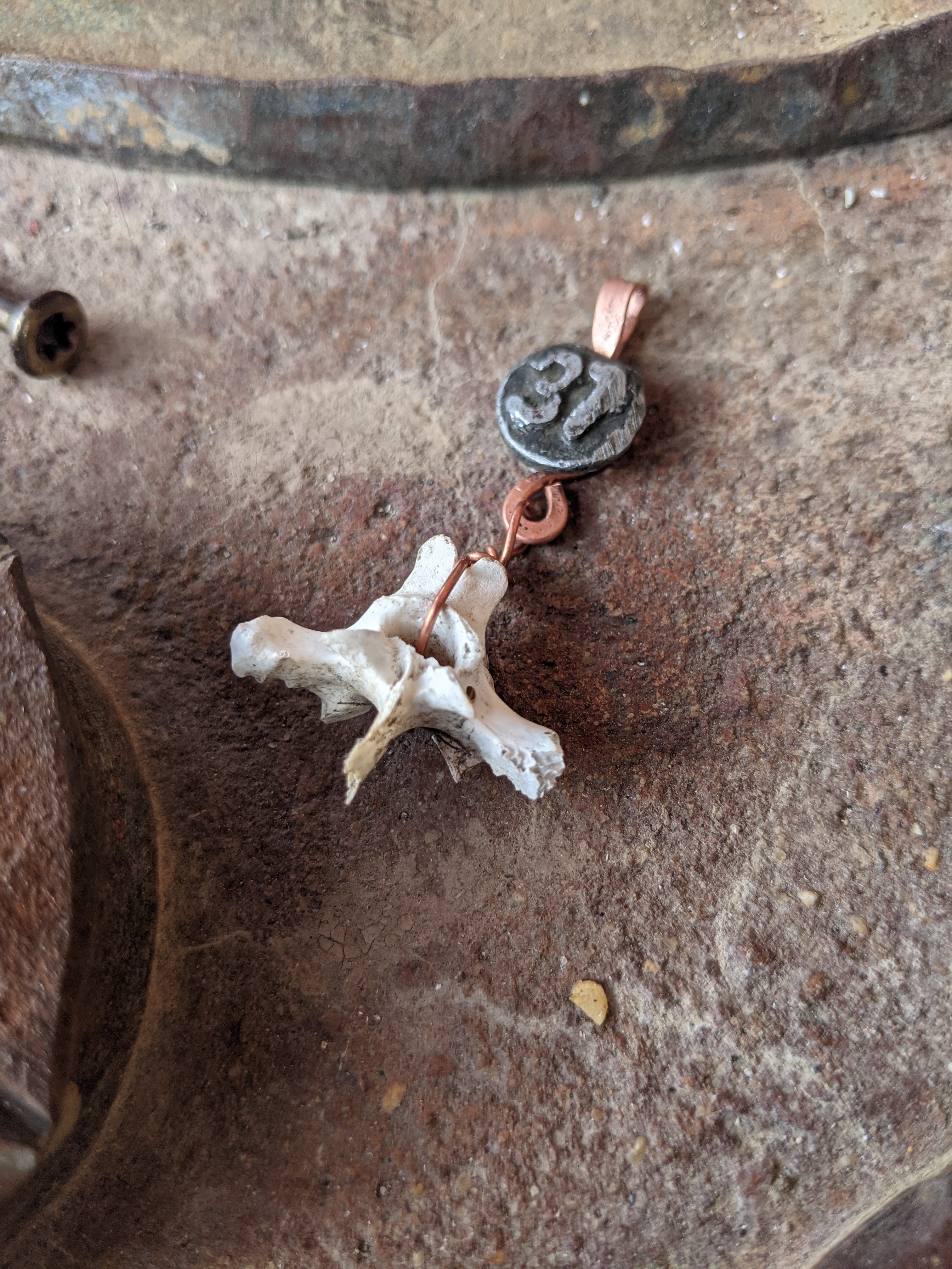 Date Nail bone pendant #37