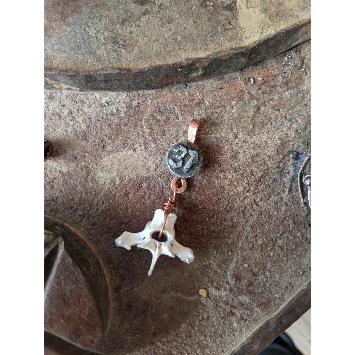 Date Nail bone pendant #37