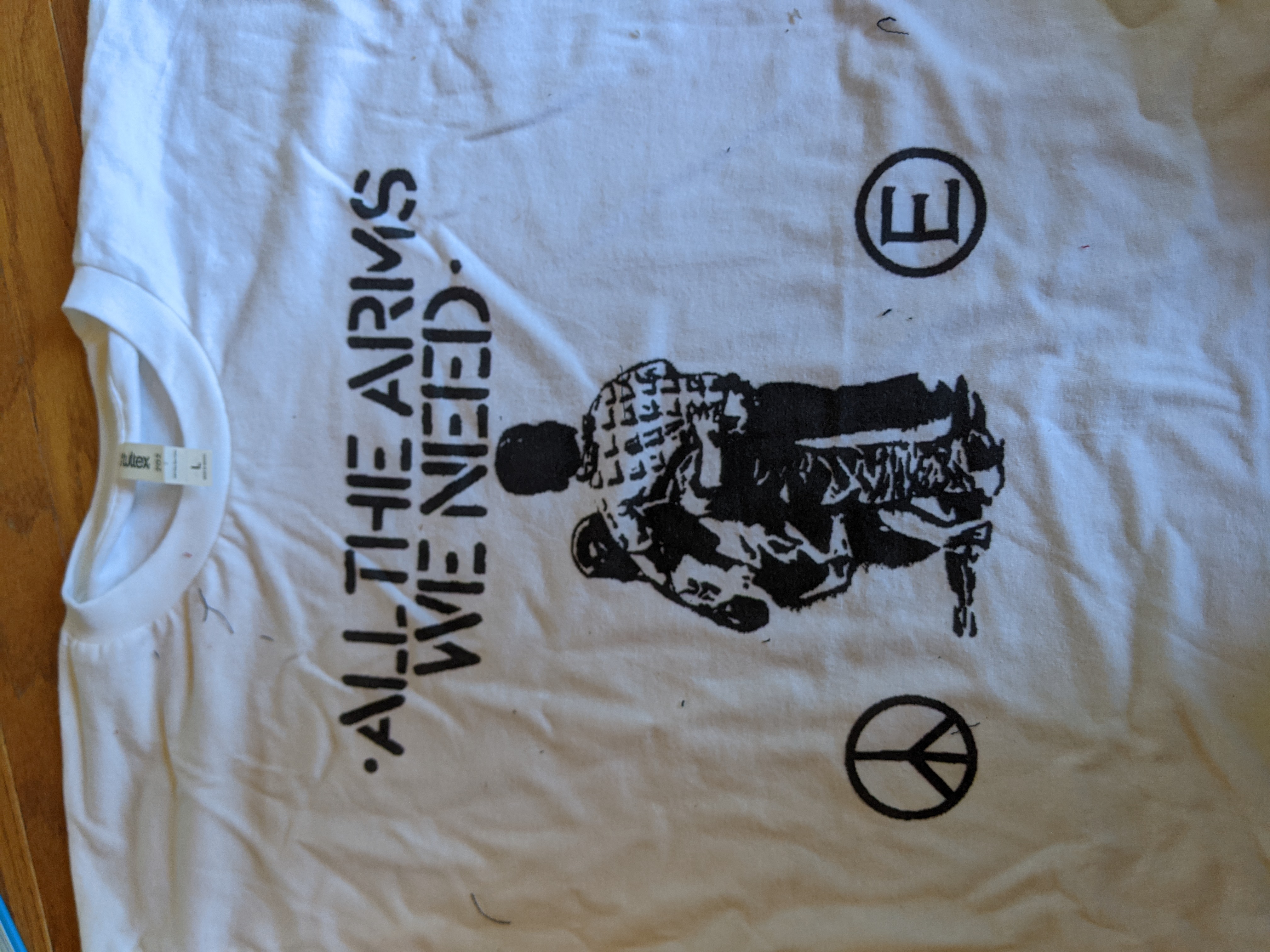 All the Arms we need T shirt size Large
