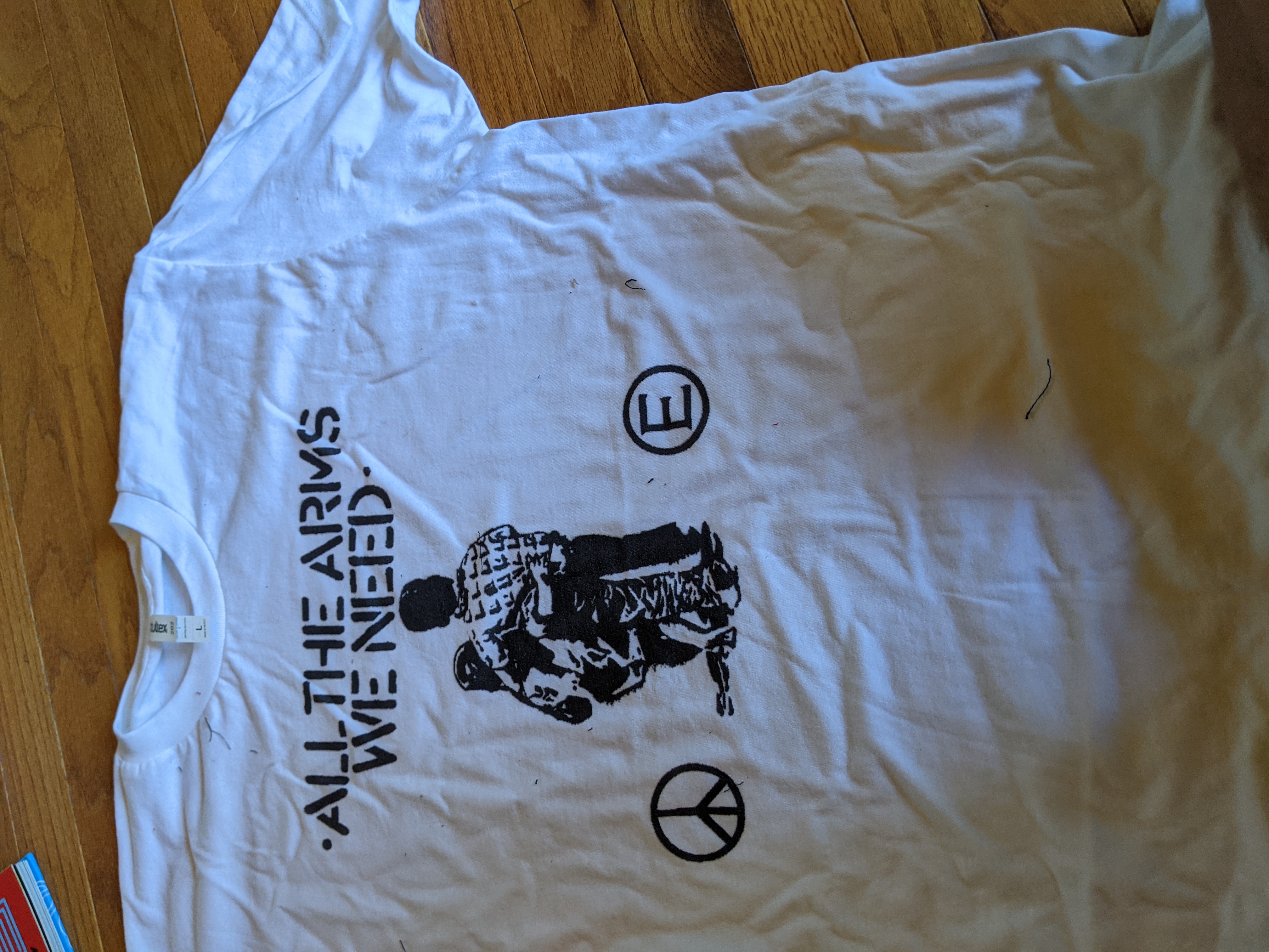 All the Arms we need T shirt size Large