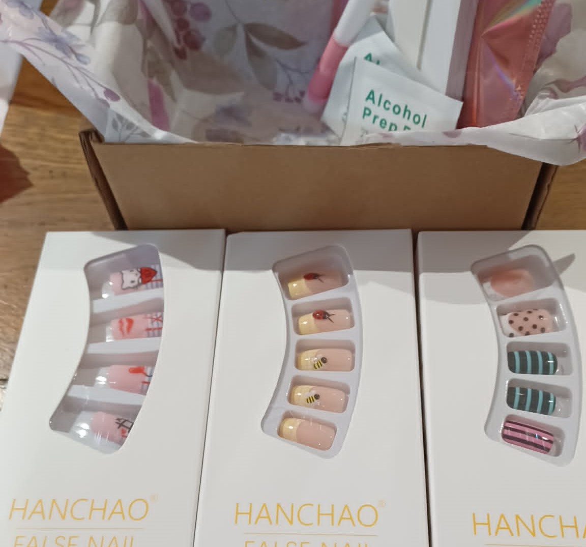 Boxed press on nail bundle - various designs