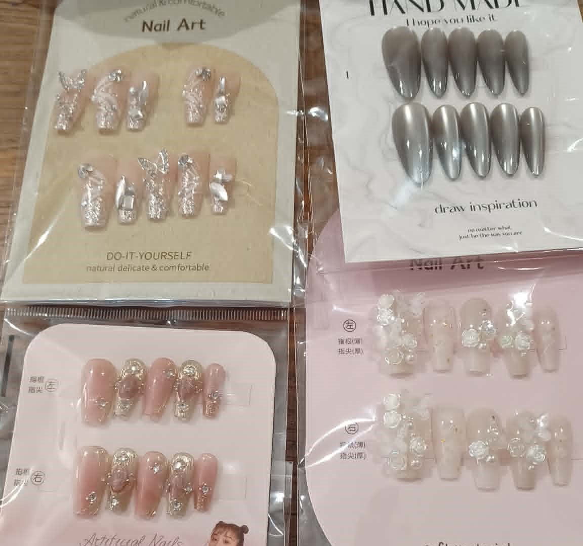 Mystery selection of 3 sets of hand finished press on nails plus chances of extra gifts
