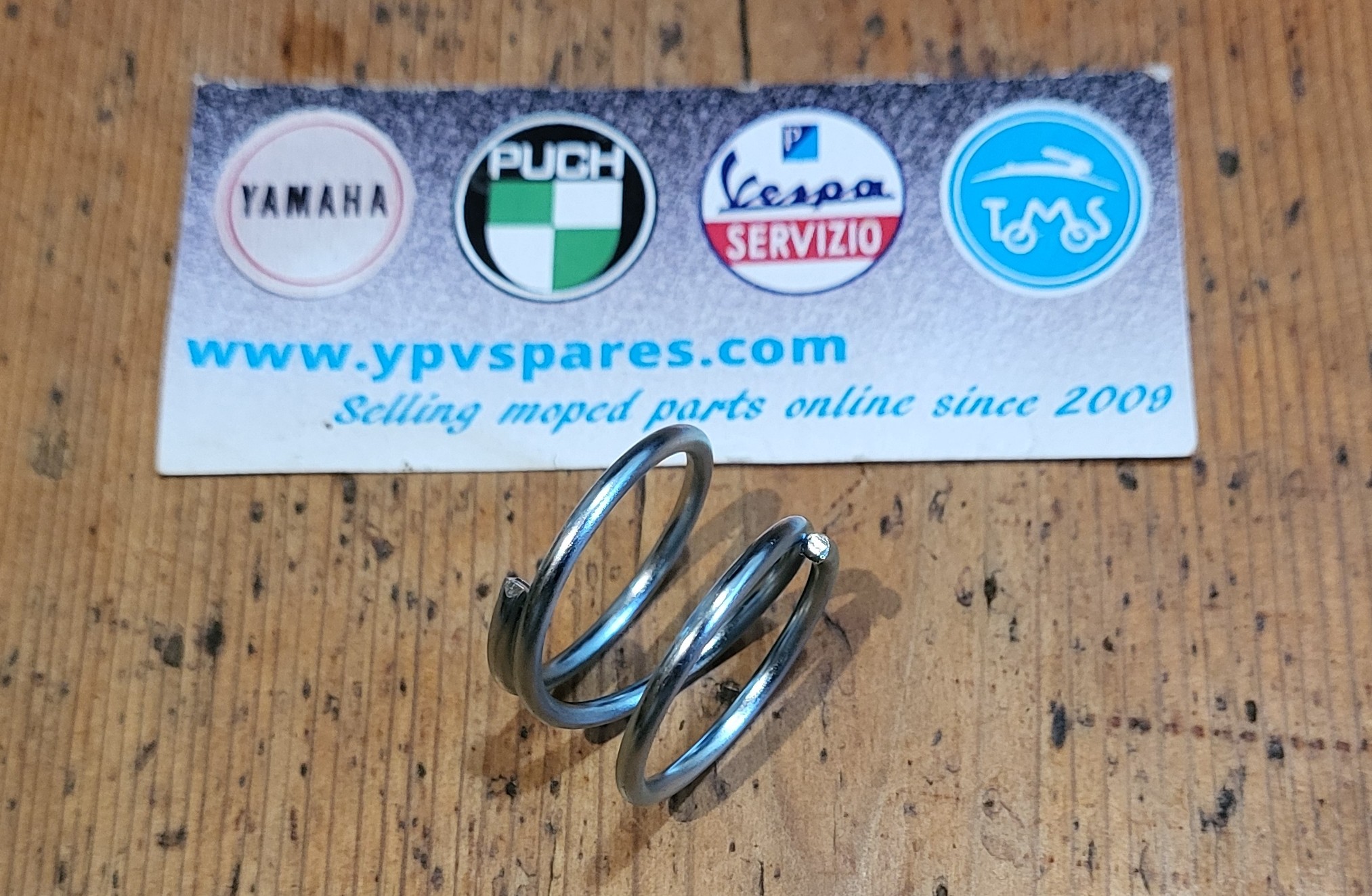FS1/FS1E Spring for rear brake anchor/torque arm.