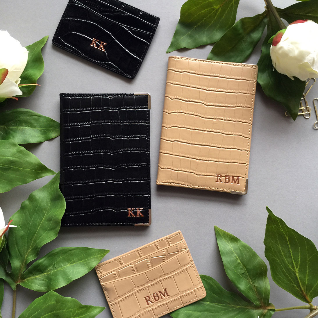 black embossed leather monogram passport holder