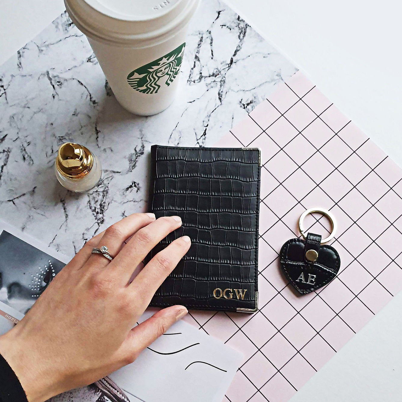 black embossed leather monogram passport holder