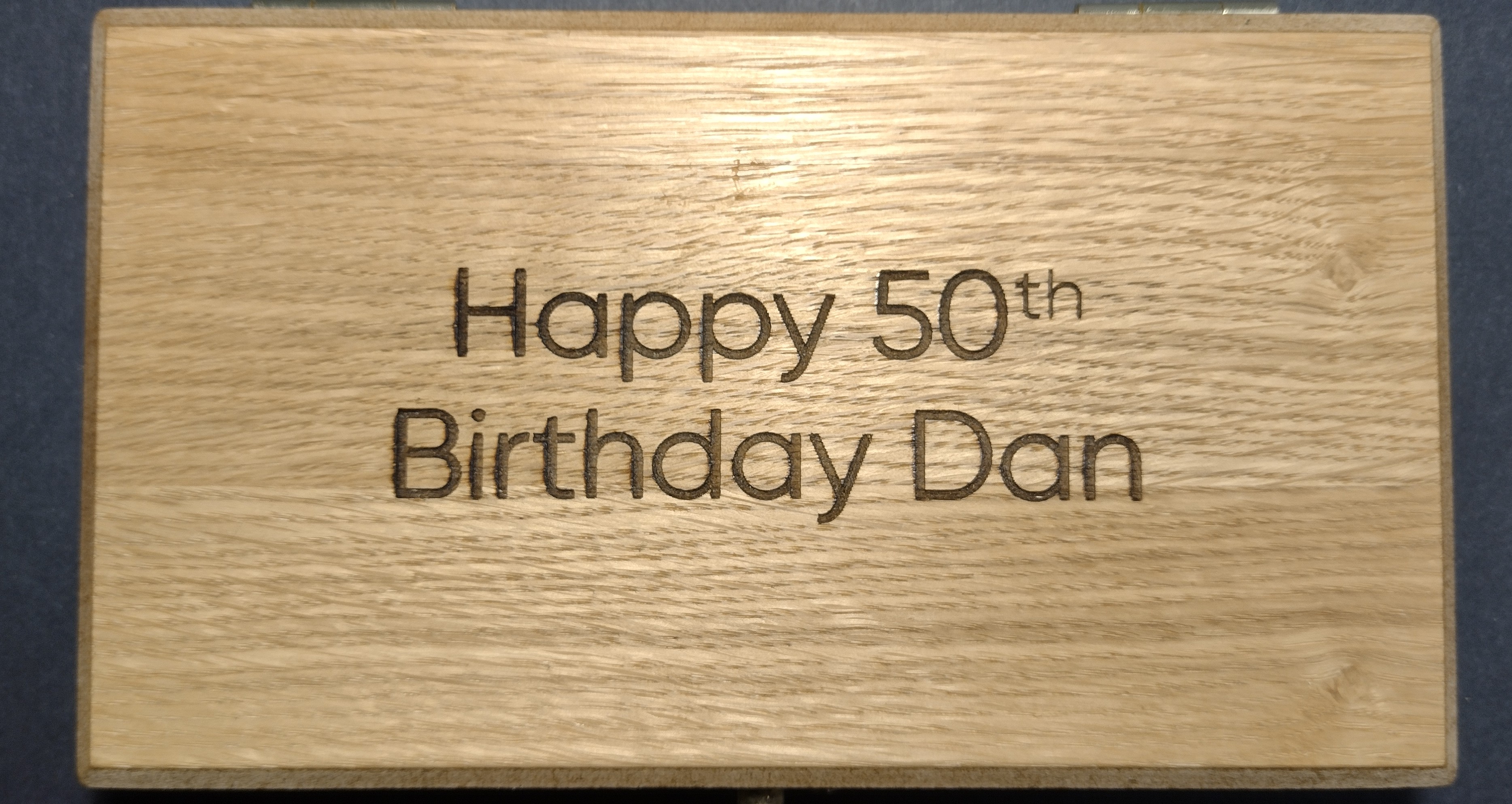Personalised message laser engraved on oak fishing float box by moon groves laser Devon