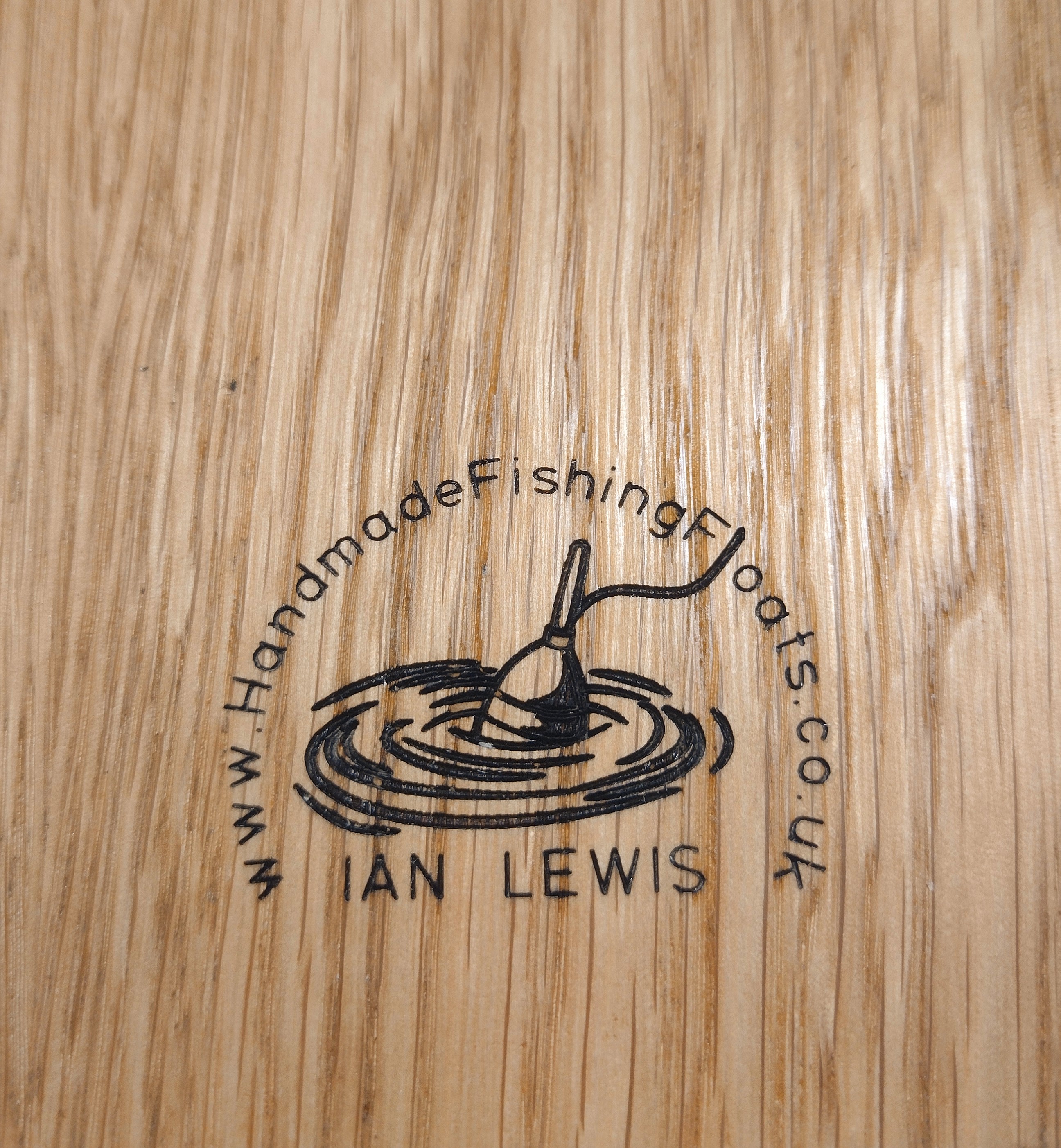 logo laser engraved on oak float box