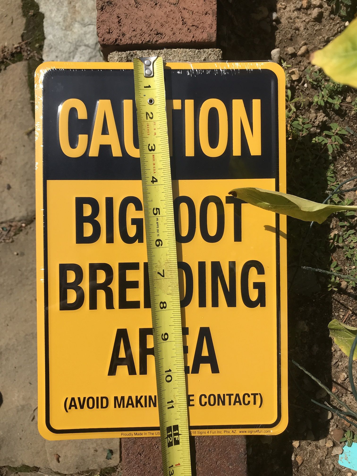 Caution Bigfoot Breeding Area (Avoid Making Eye Contact) Metal Sign
