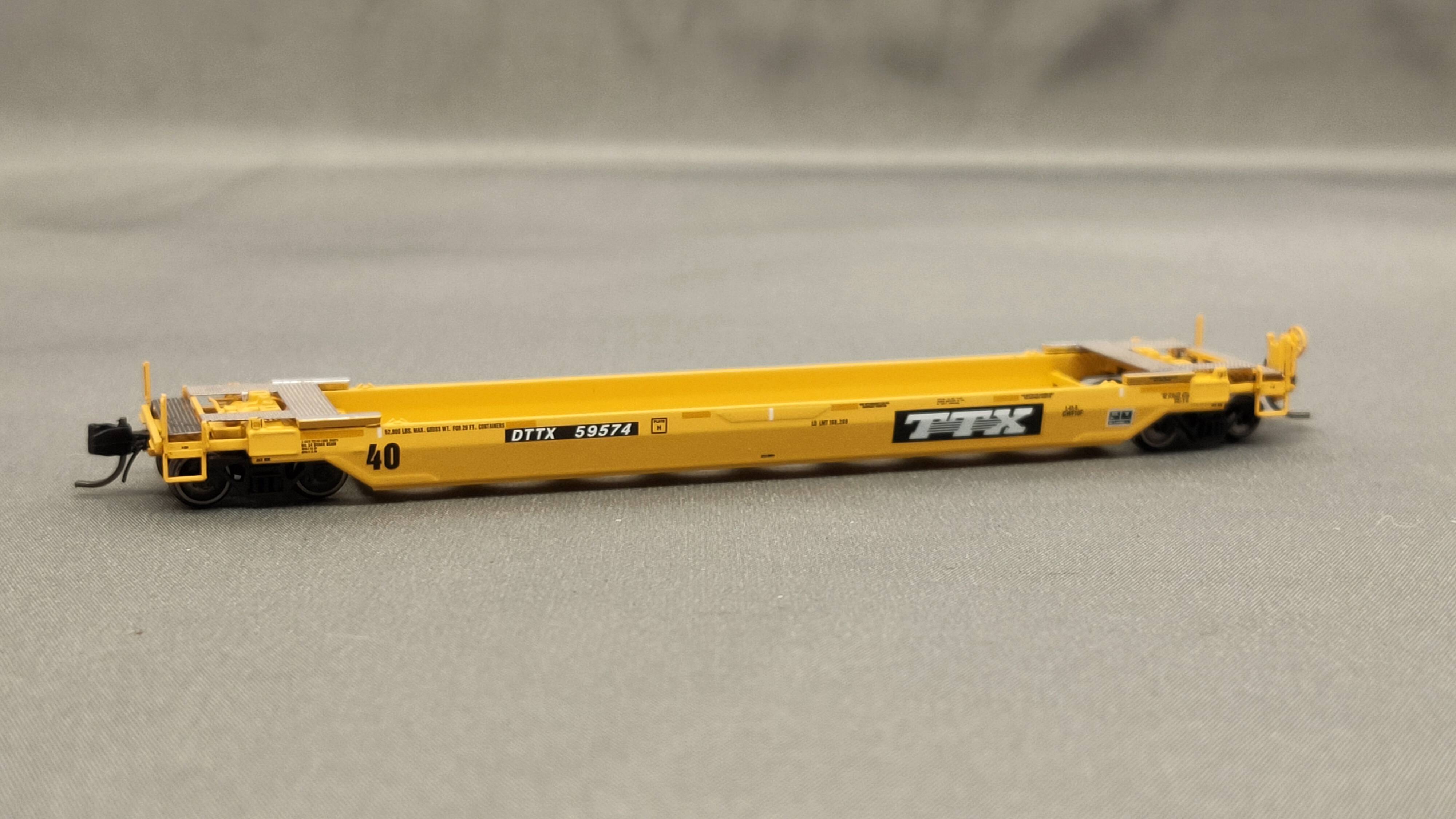 Atlas N Scale. 40' rebuilt well car, TTX early logo 59574