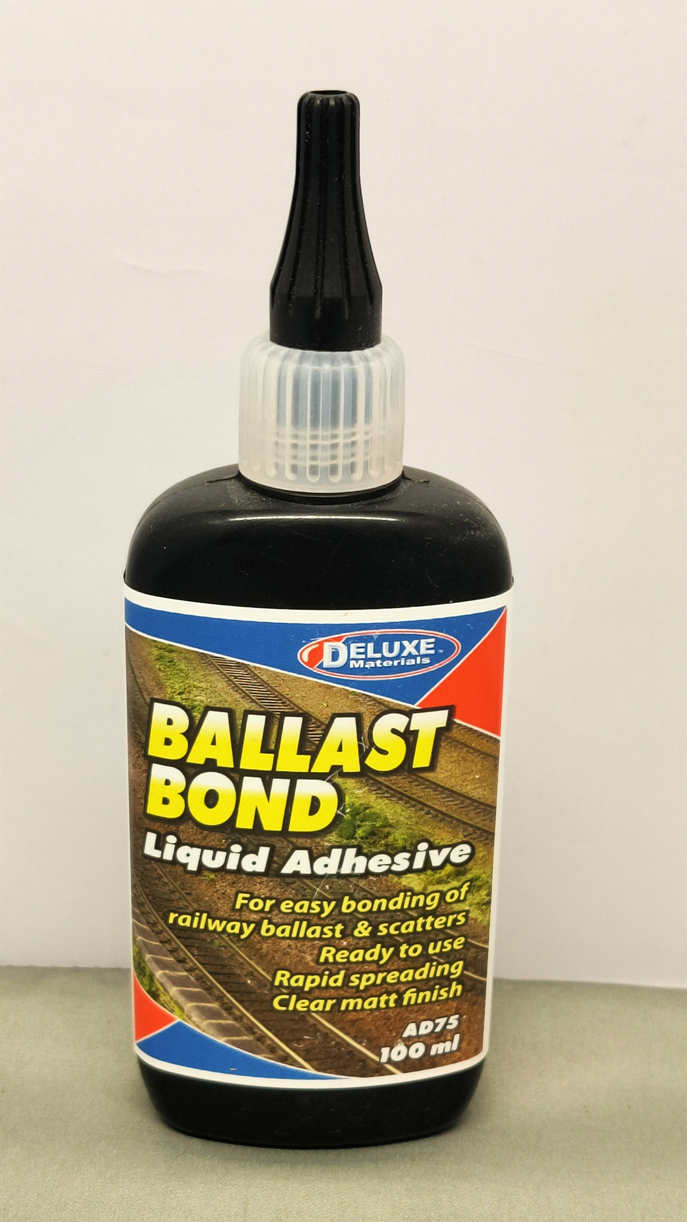Deluxe Materials. Ballast bond liquid adhesive