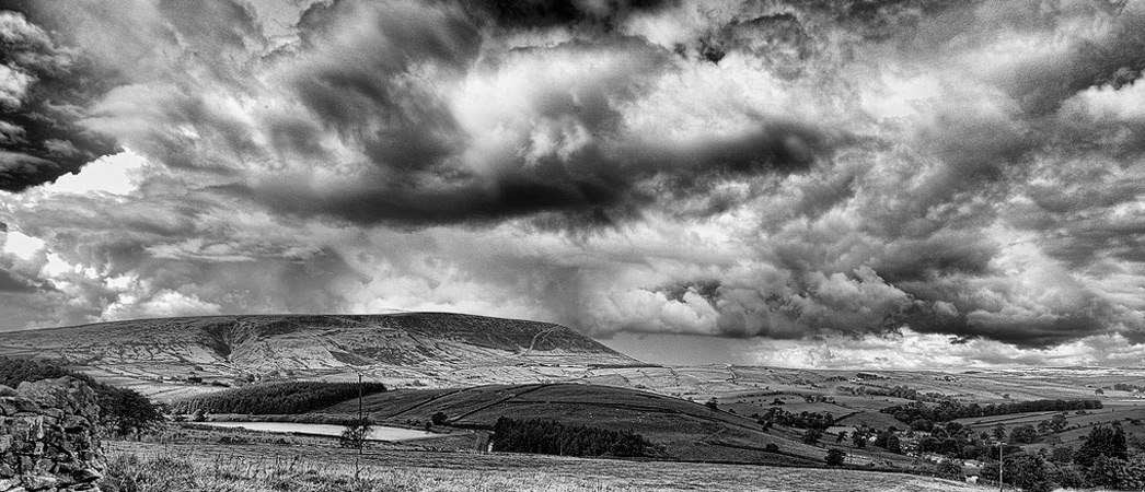 Pendle Hill under storm clouds