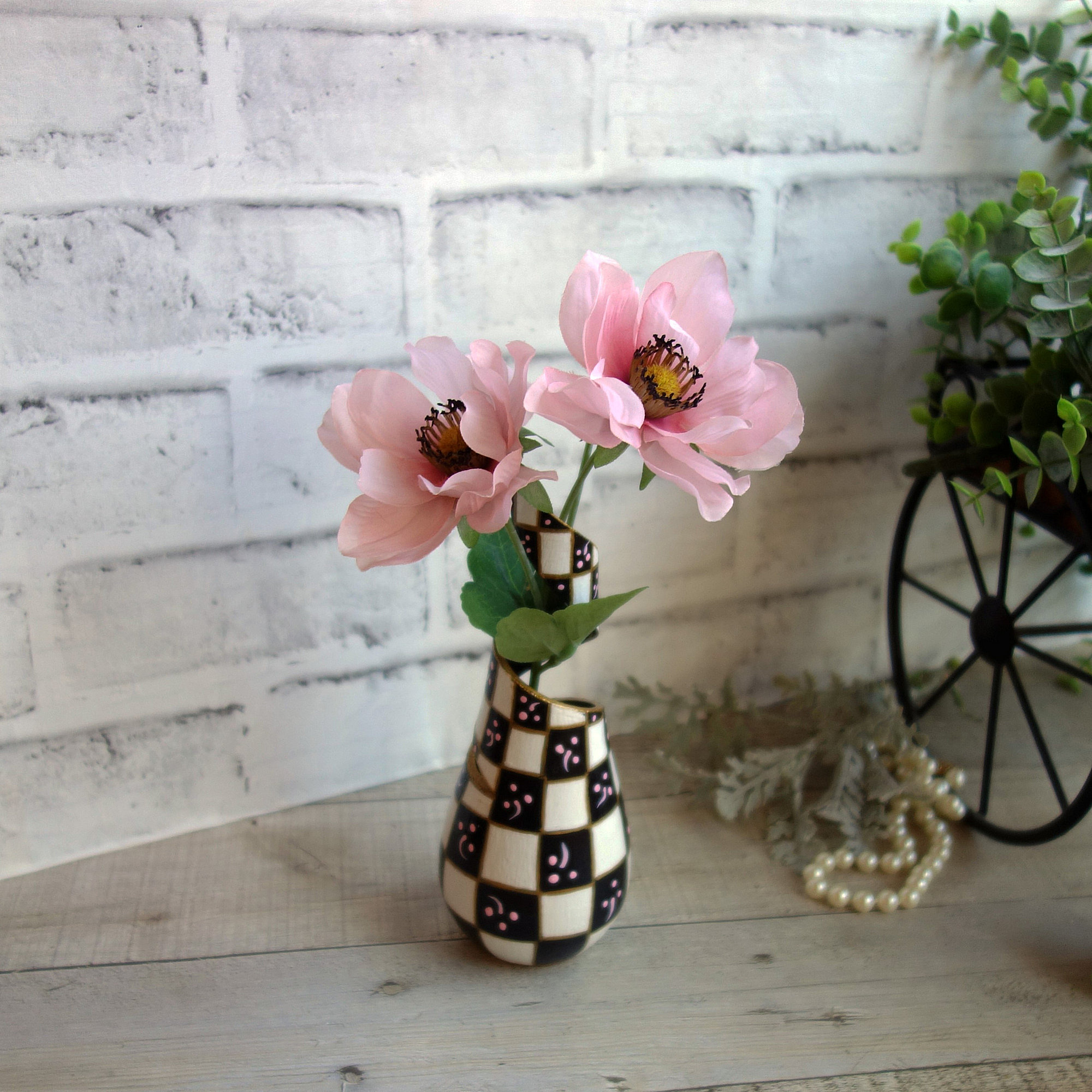 Whimsical Checked Swirl Vase with Pink Anemones
