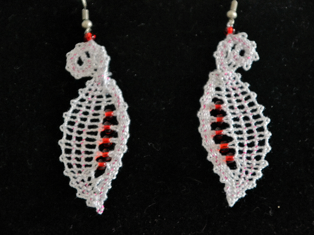 Uhani 16 - belo rdeči svetleči