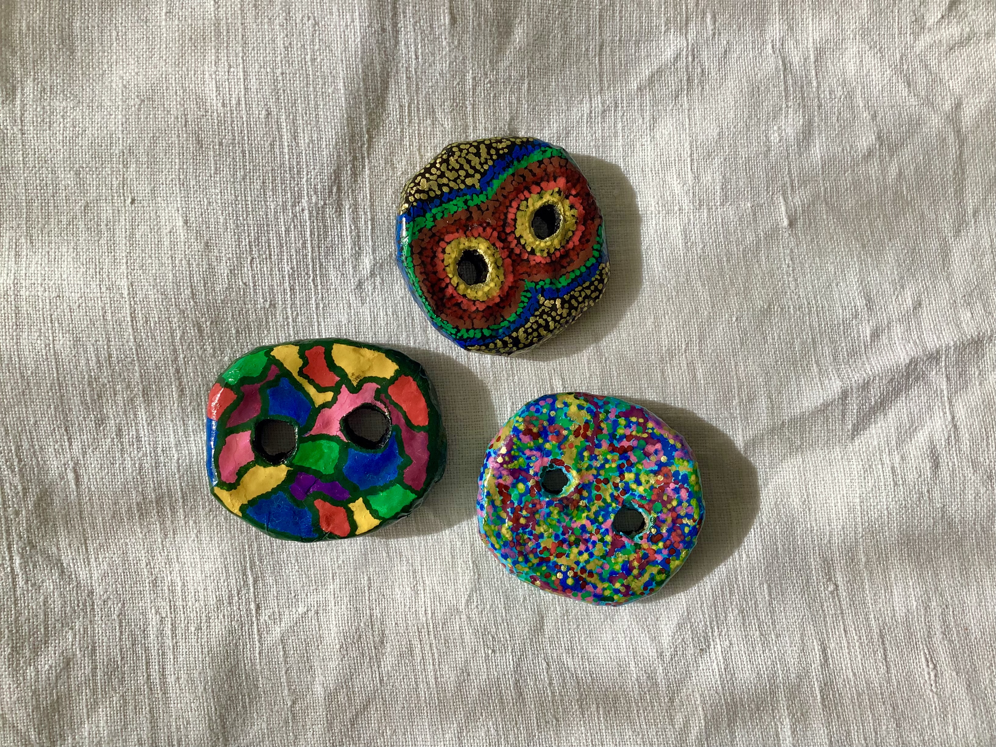 Giant buttons brooches