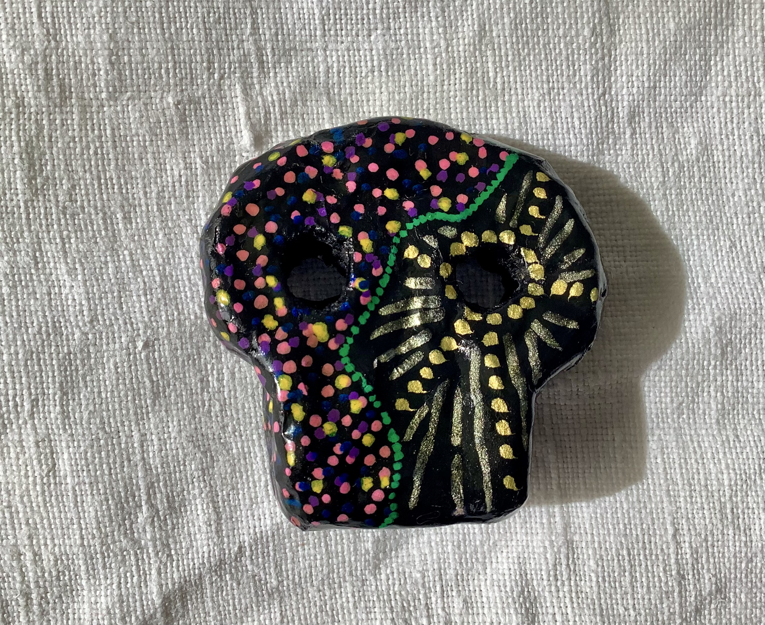 Skull brooch