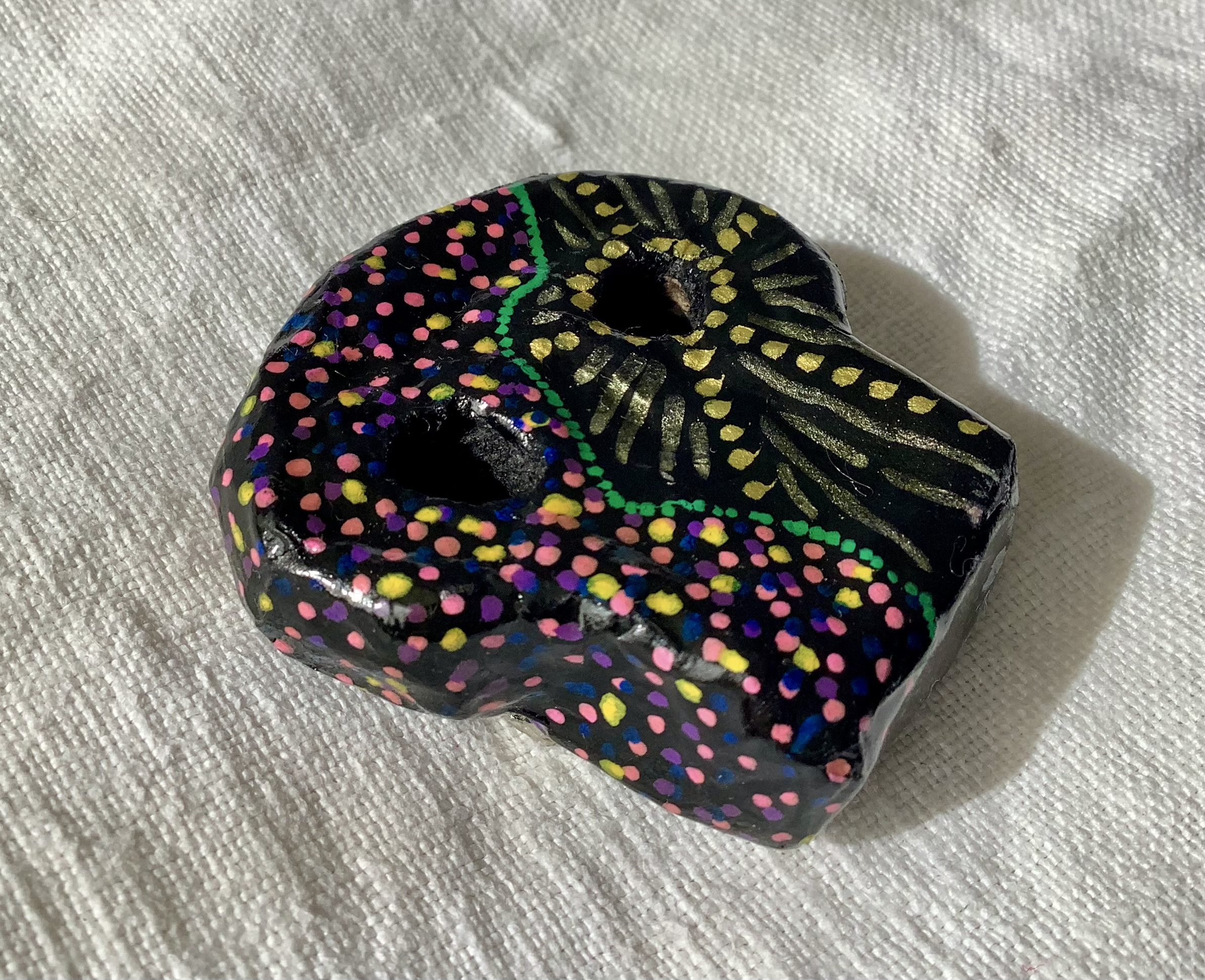 Skull brooch
