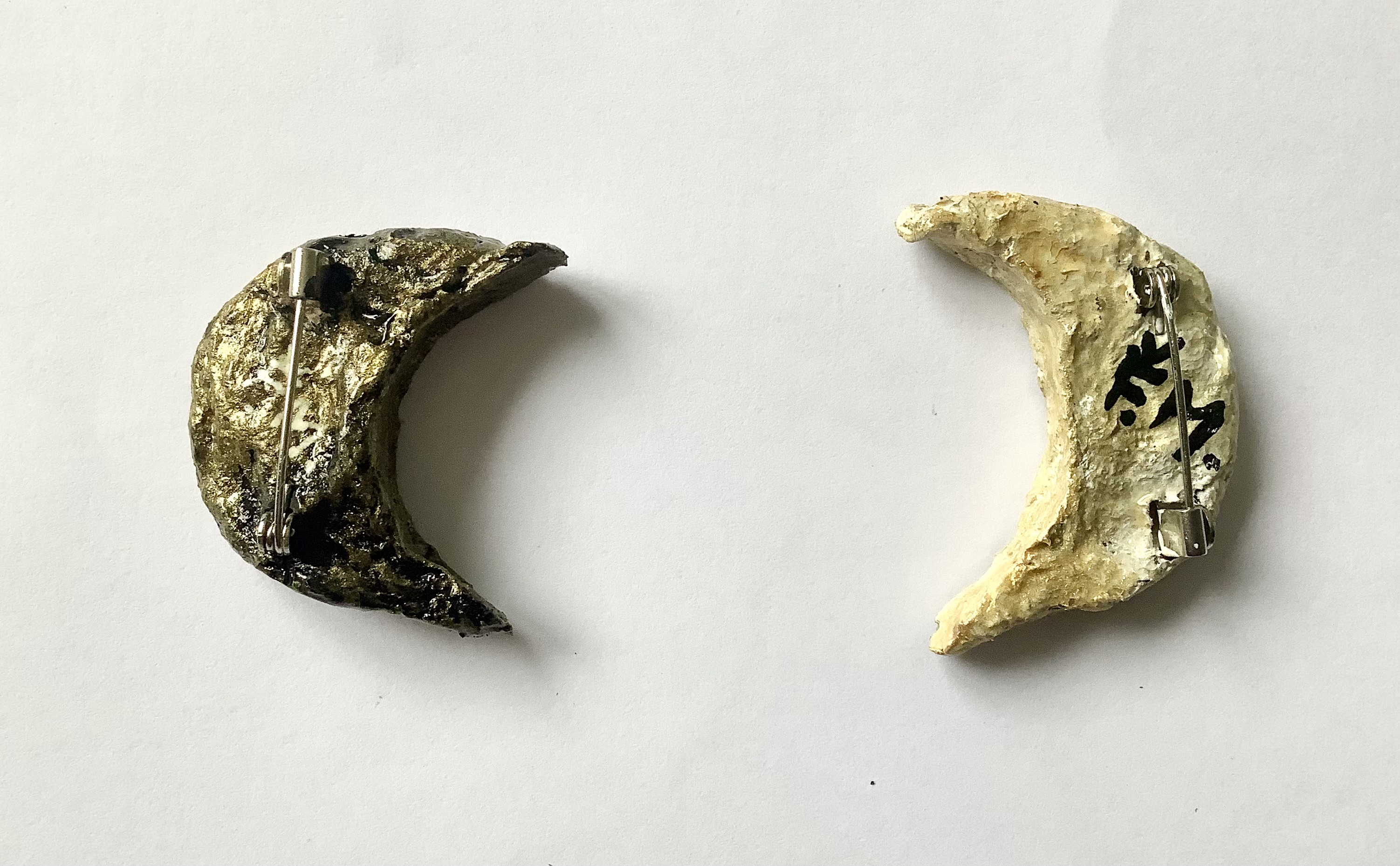 Lunita brooches
