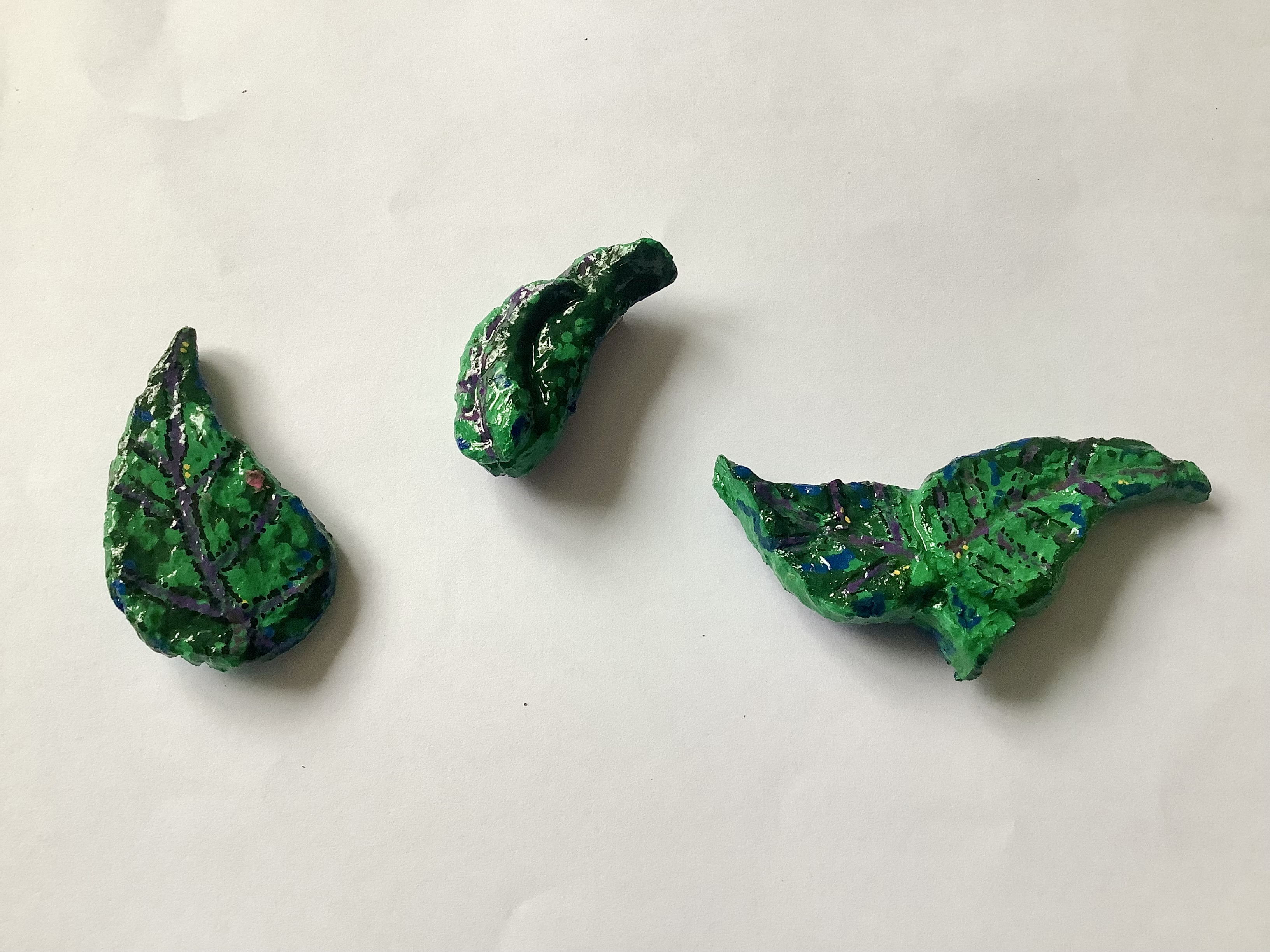 Leafy green brooches