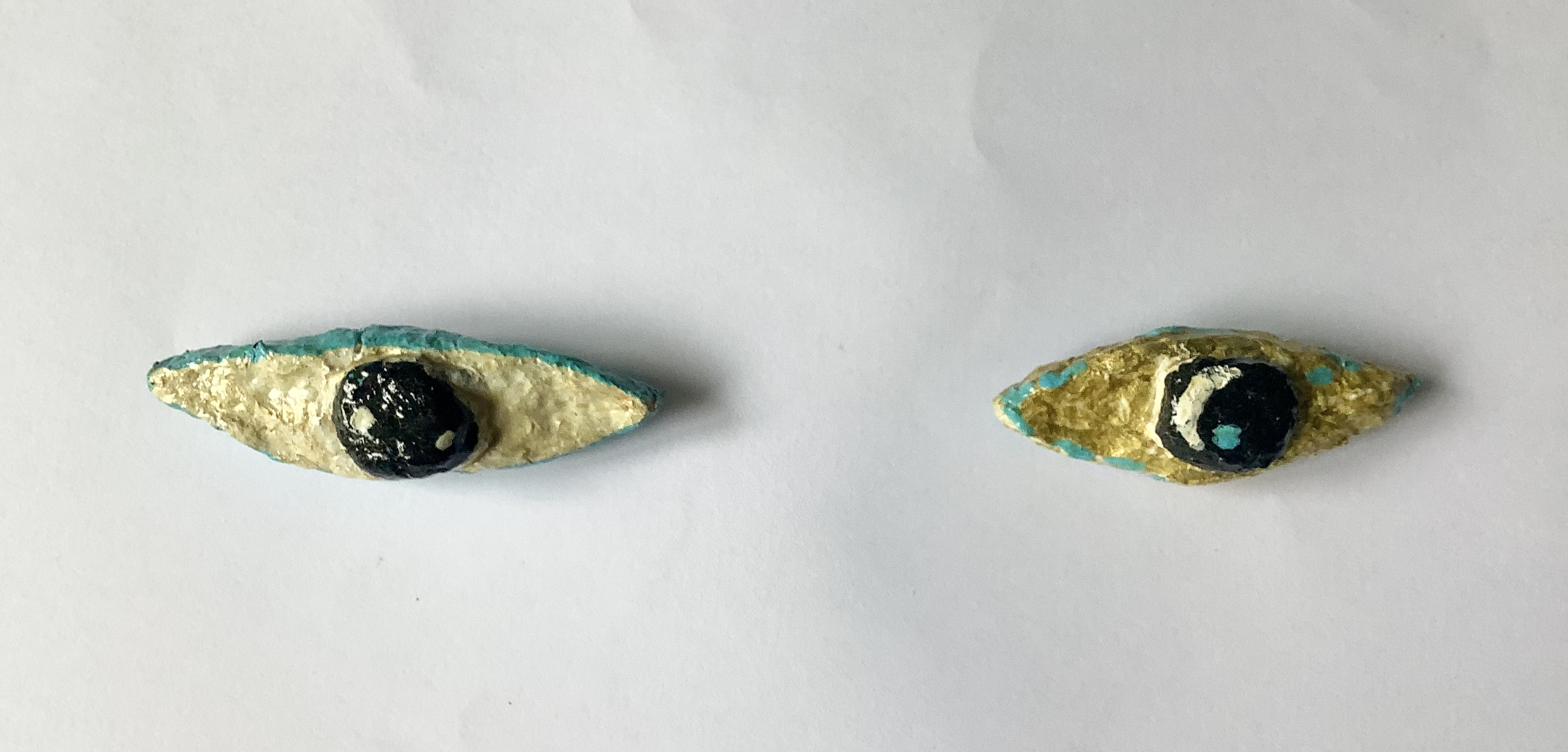 Eye brooches