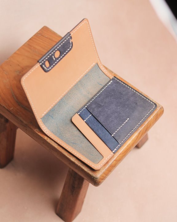 blue Peregrine passport wallet open