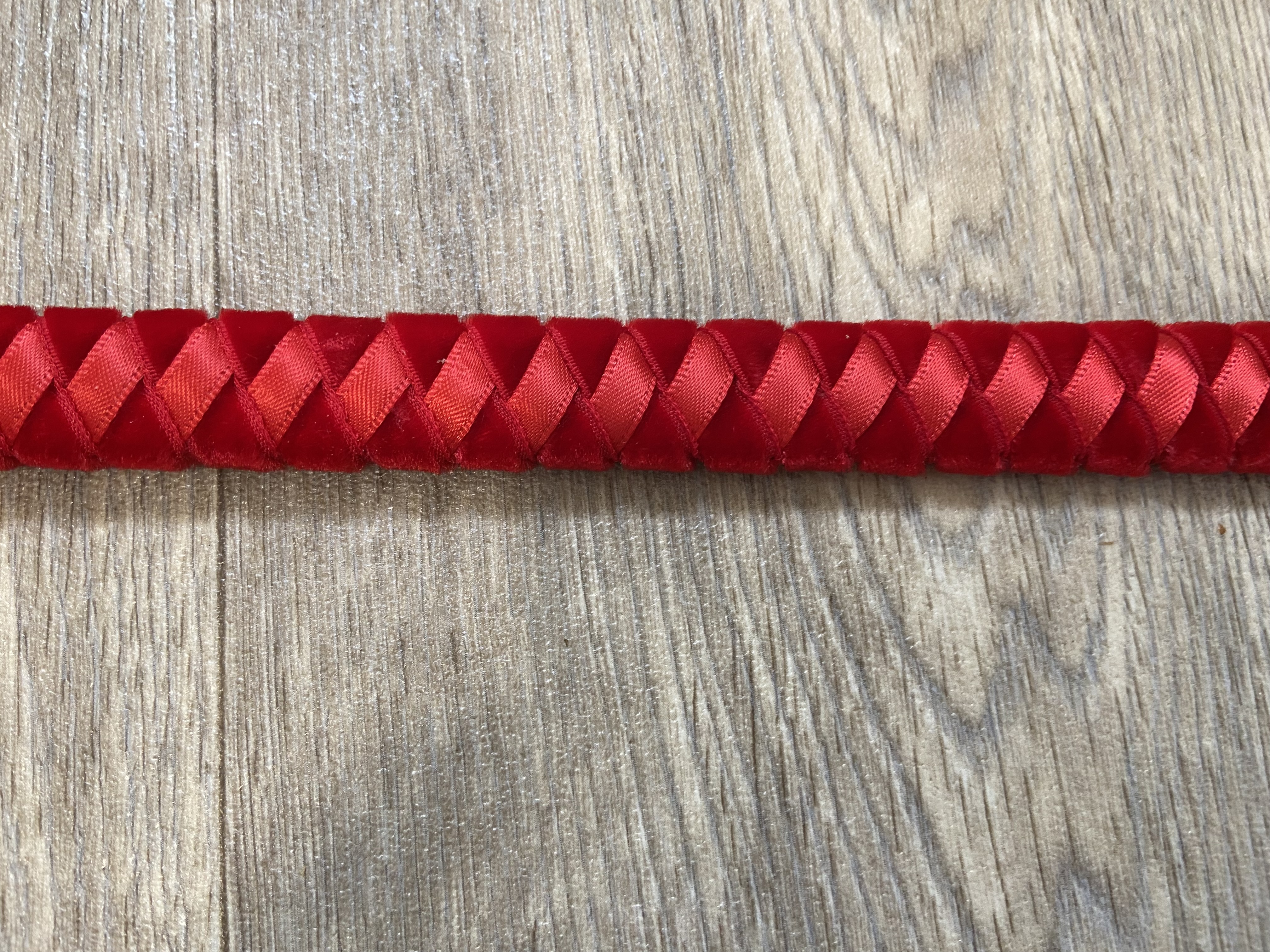 Red velvet and satin browband. 15.75” large cob. Brown leather. BN