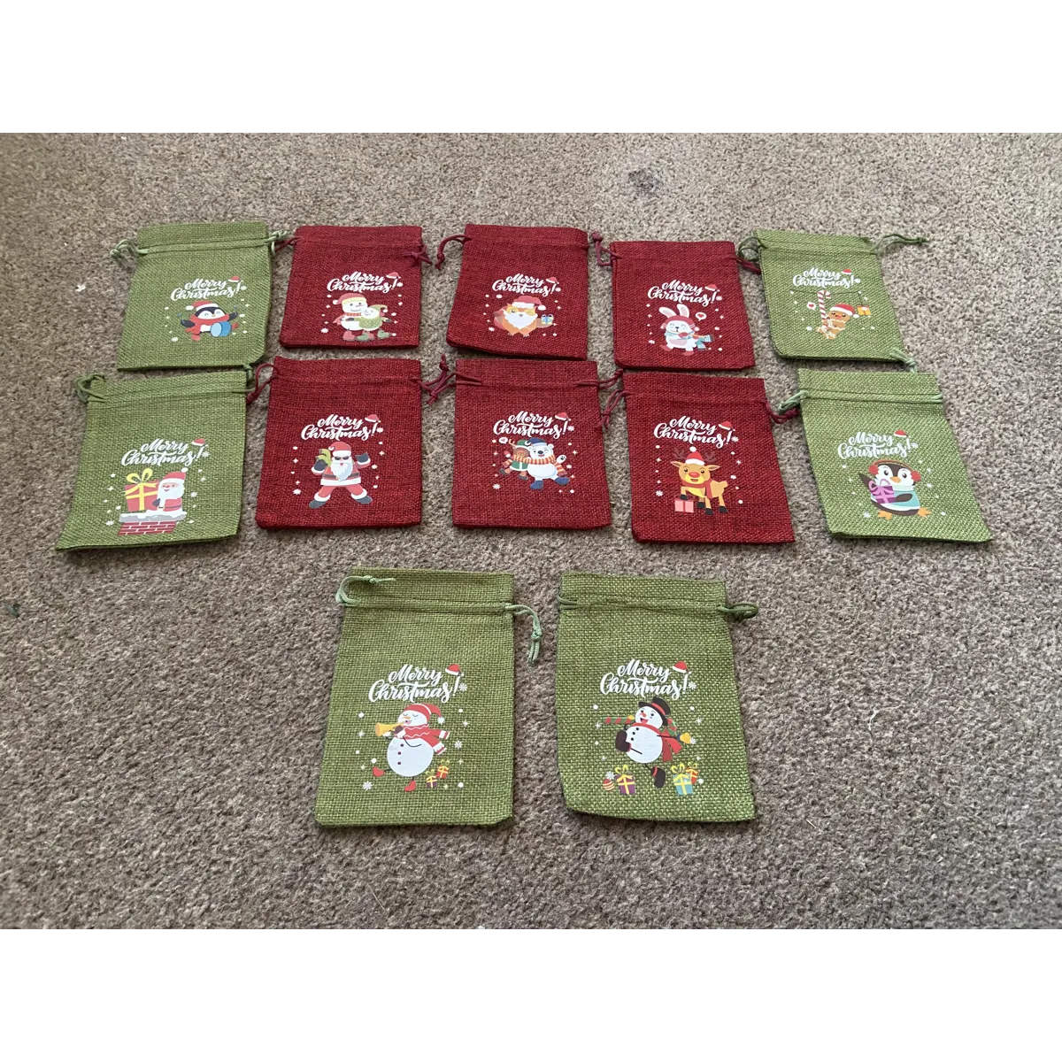 Hessian Xmas bags x 12. 5.5” x 4”.