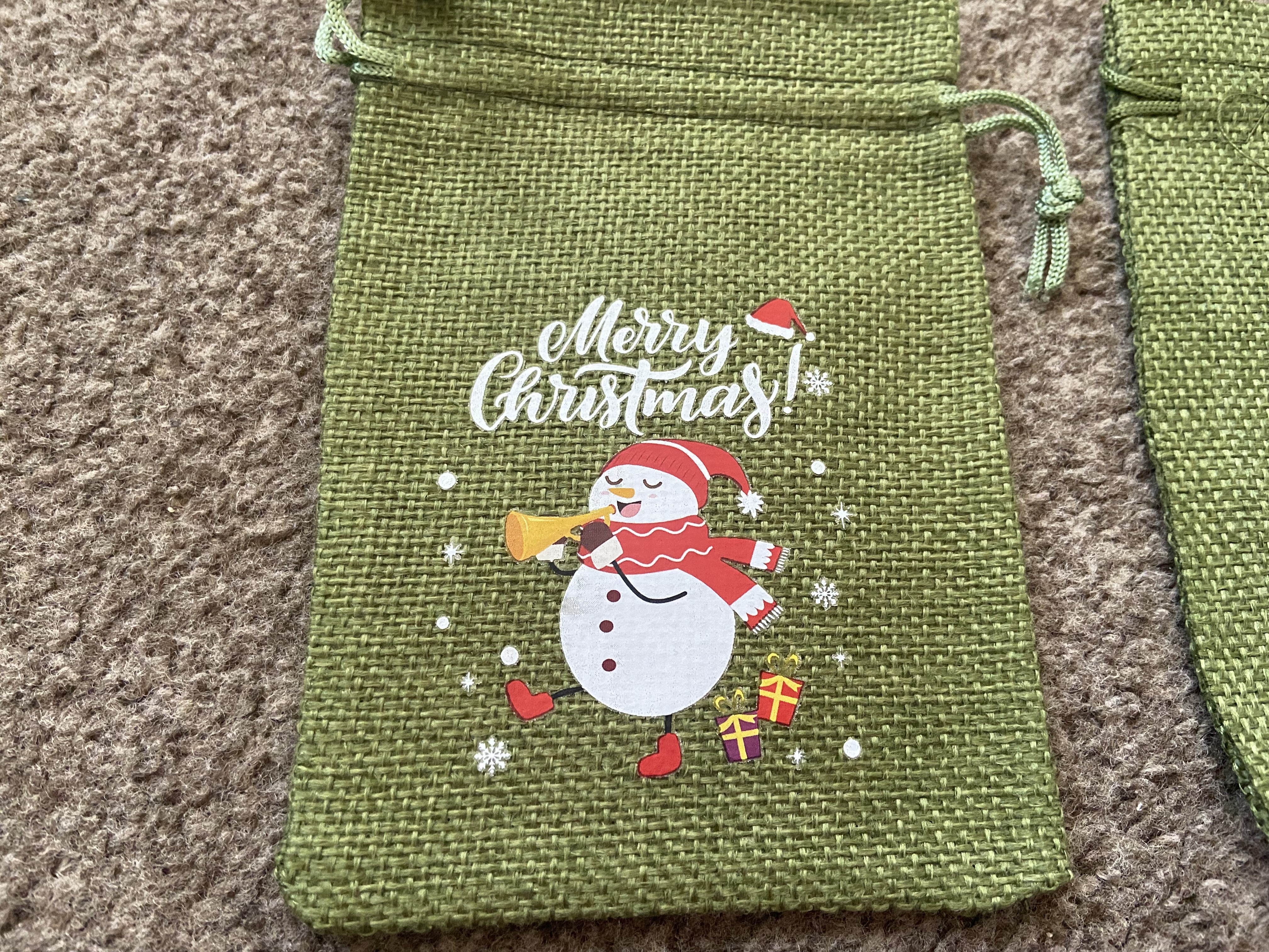Hessian Xmas bags x 12. 5.5” x 4”.