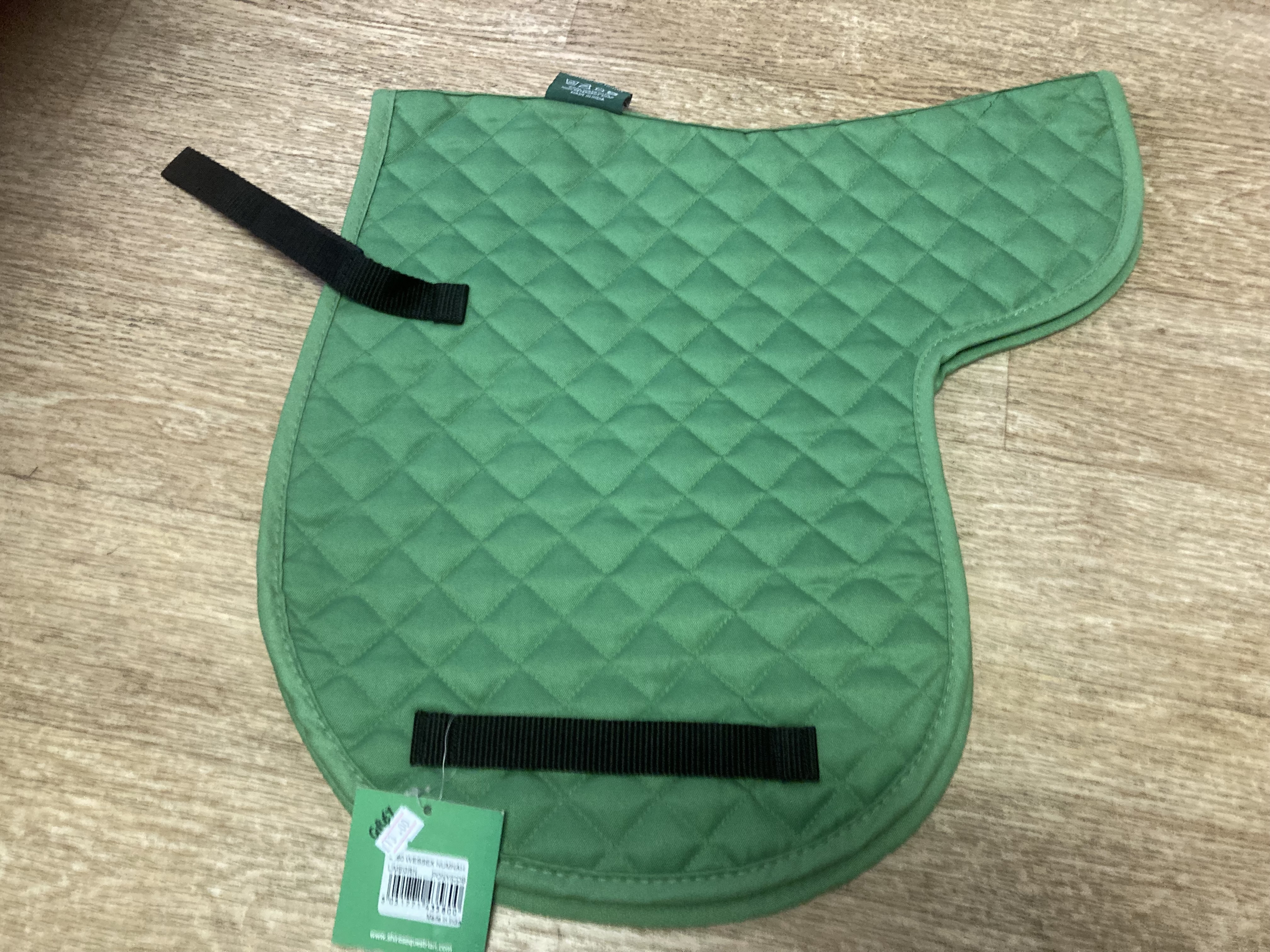 Shires Green nunmah with black girth straps. BN but shop soiled.